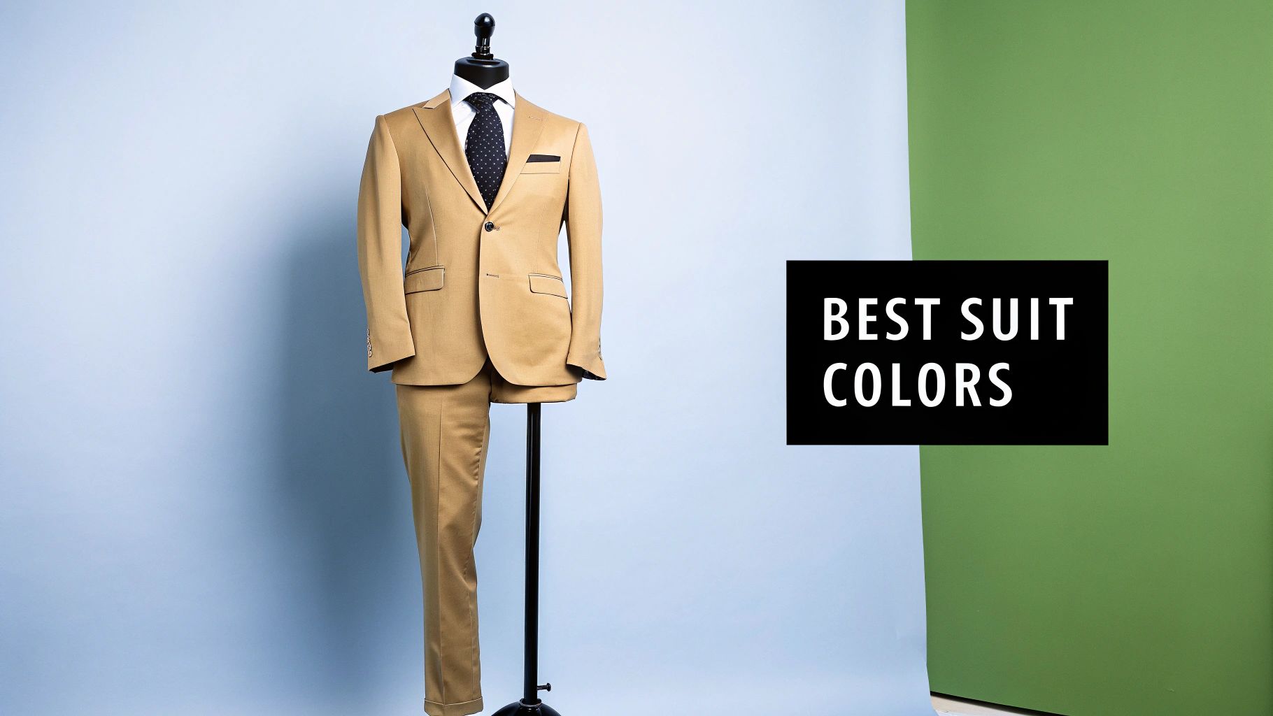 A tan suit displayed on a mannequin against a blue and green background, with 'BEST SUIT COLORS' text.