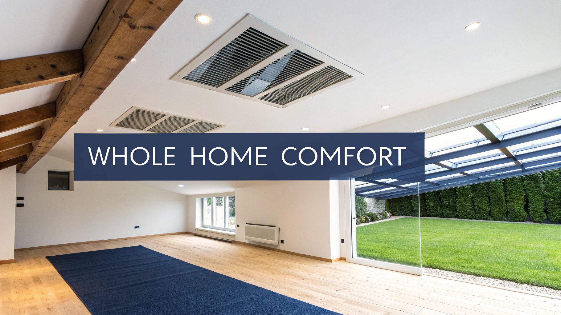 A bright, modern room with ceiling air conditioning, wooden floors, and a view of a green lawn, emphasizing whole home comfort.