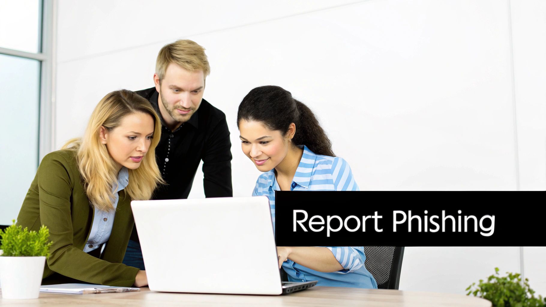 Three diverse colleagues collaborate on a laptop in an office, with 'Report Phishing' text overlay.