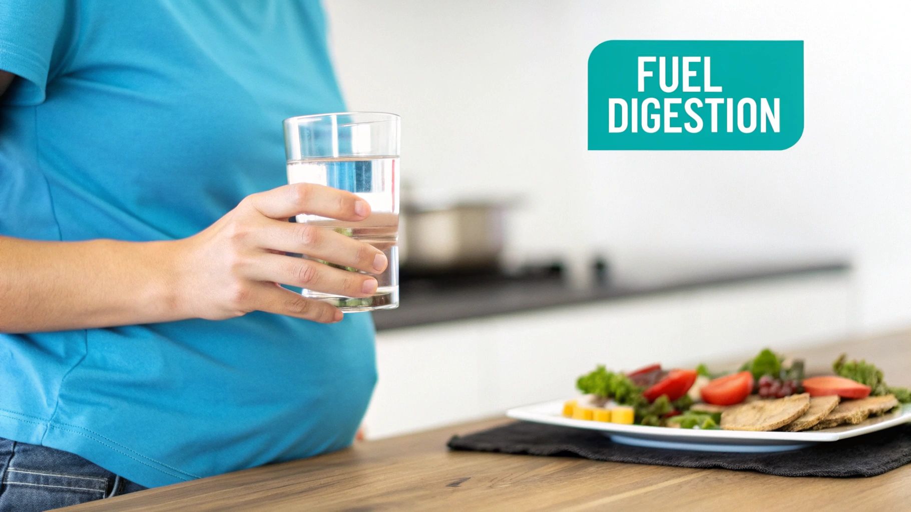 A pregnant woman holds a glass of water next to a healthy meal, promoting digestion.