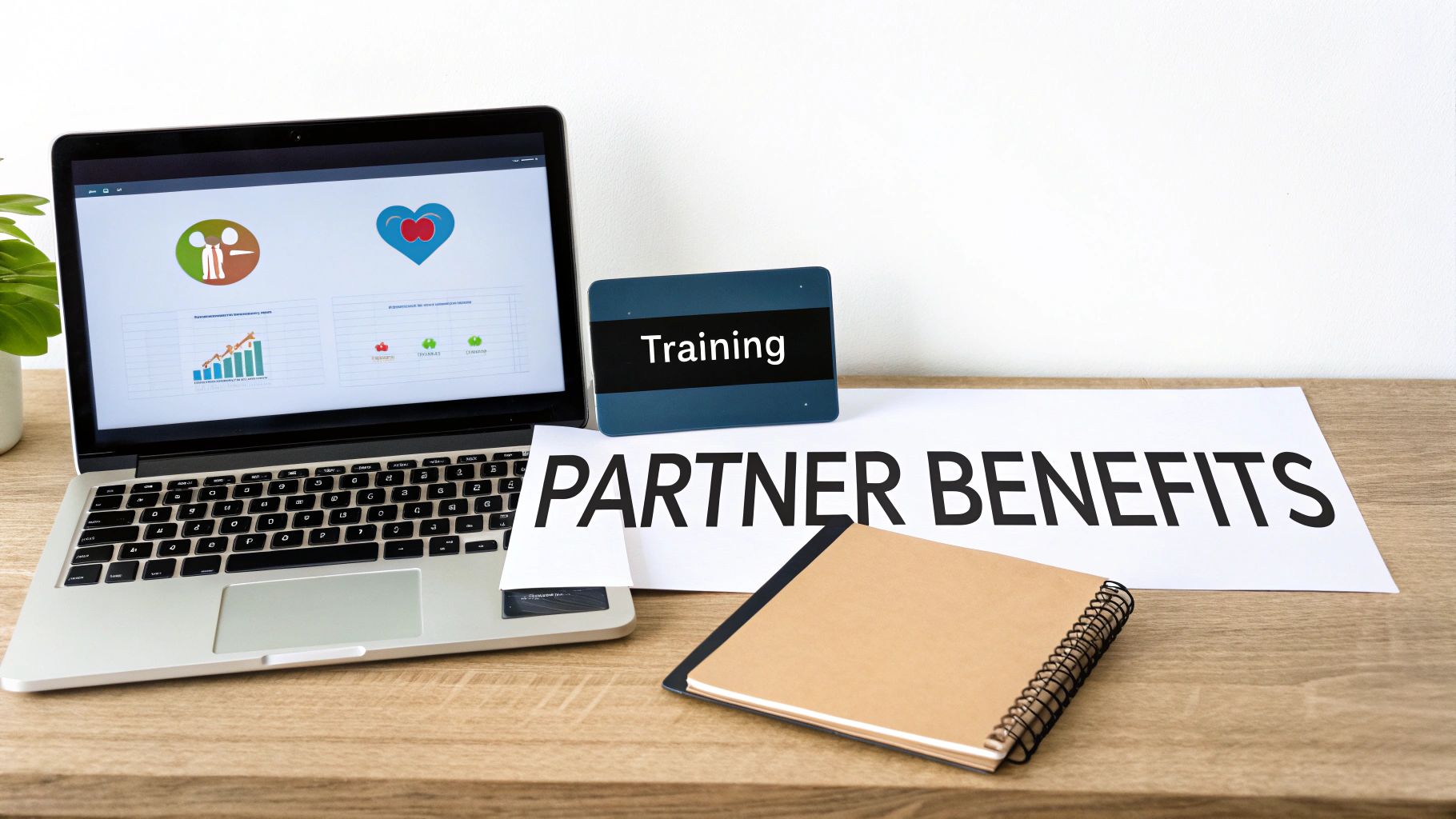 A laptop displays partner program data next to a 'Training' sign and 'PARTNER BENEFITS' text.
