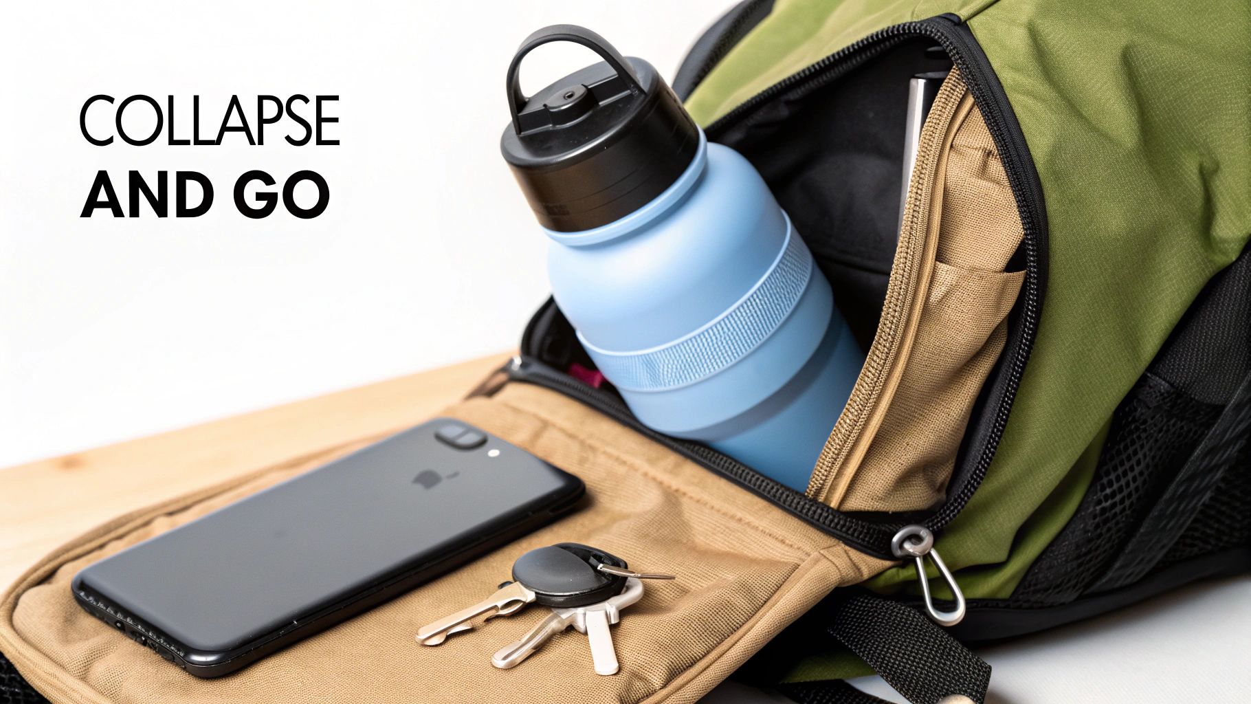 A collapsed HYDAWAY bottle fitting easily into a person's hand.