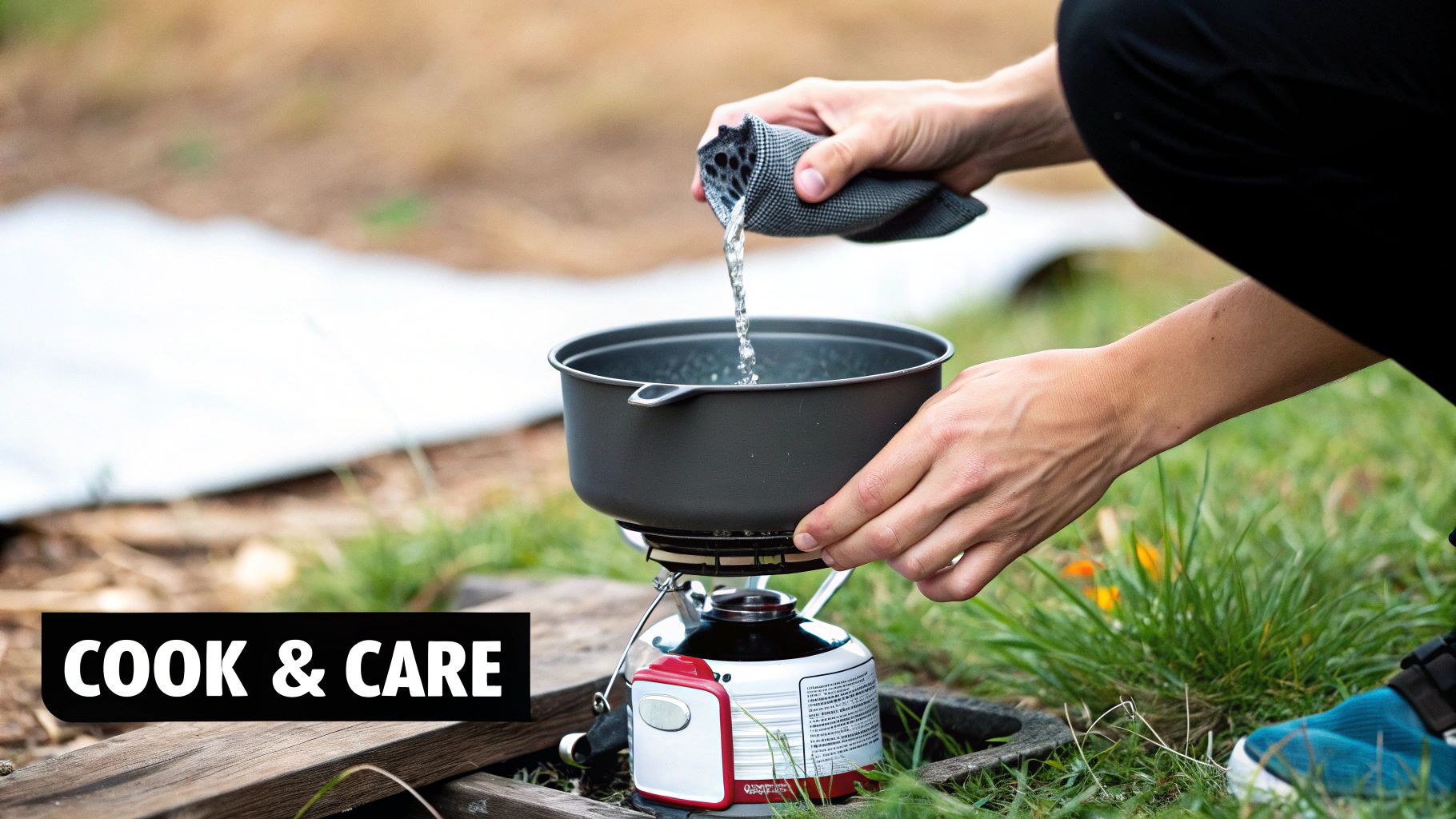 A person cooking a meal outdoors with collapsible camping pots and pans on a camp stove.