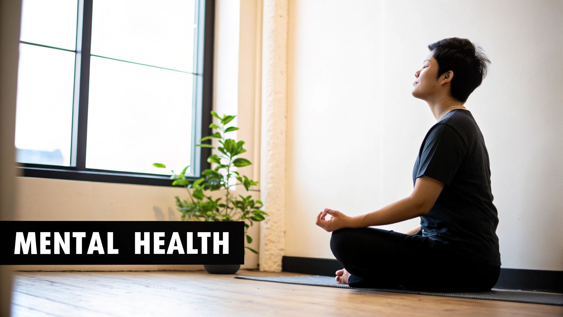 A person meditates peacefully on a yoga mat indoors, with 'MENTAL HEALTH' text overlay.