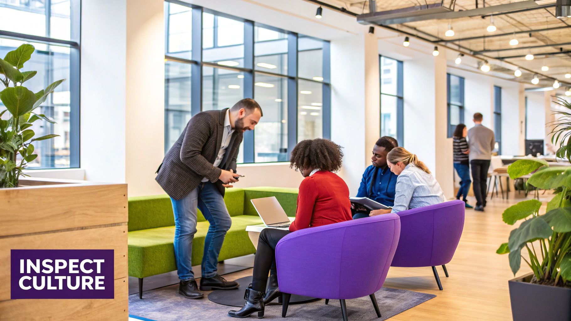 A person smiling while reviewing documents at a sunlit desk