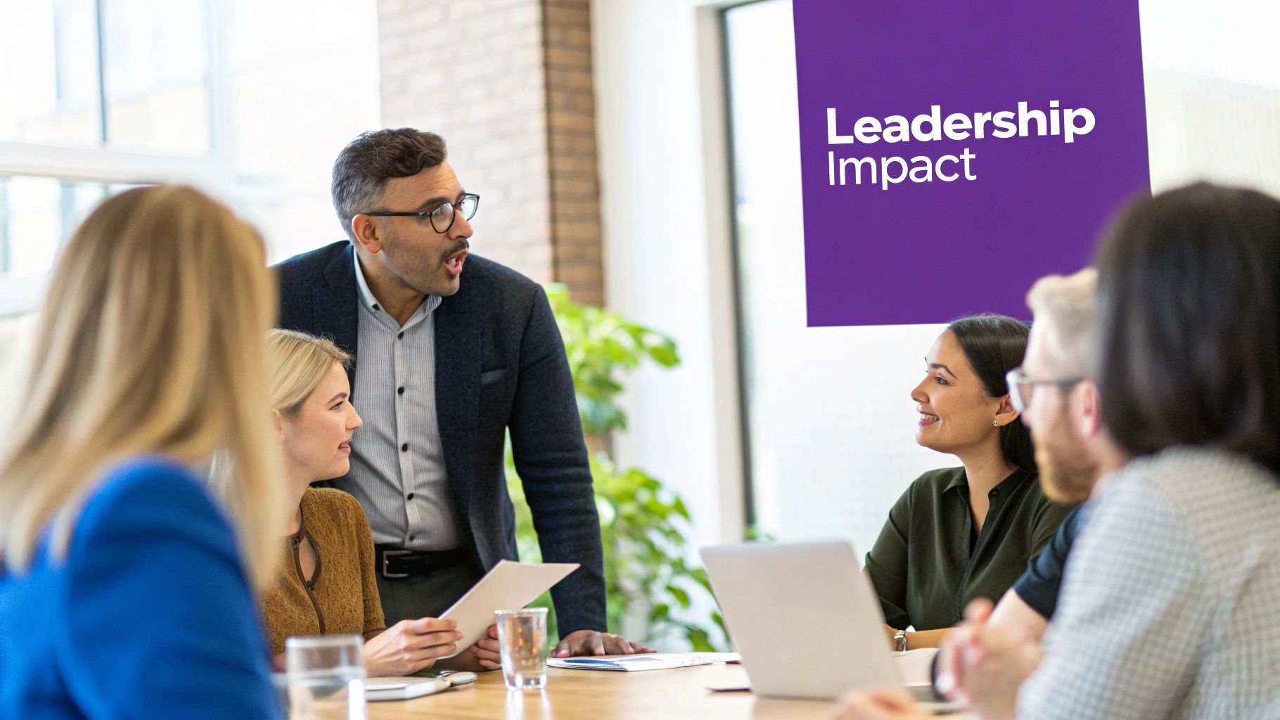 A leader calmly guiding a diverse team through a complex project, showcasing empathy and collaborative spirit.