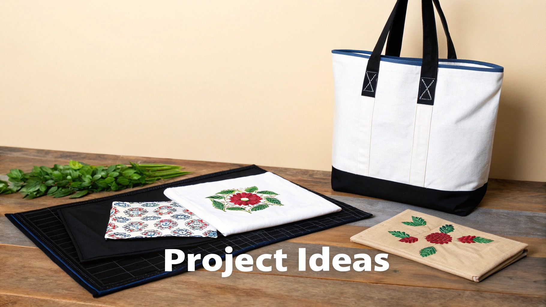 Various DIY fabric craft projects, including an embroidered tote bag and decorative fabric pieces on a wooden table.