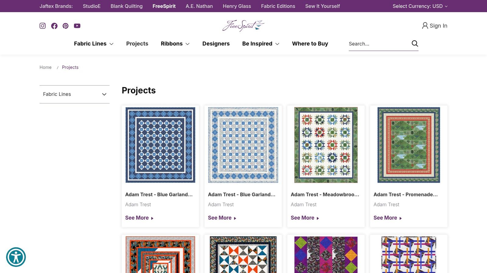 A collection of vibrant quilt project images from the FreeSpirit Fabrics website.