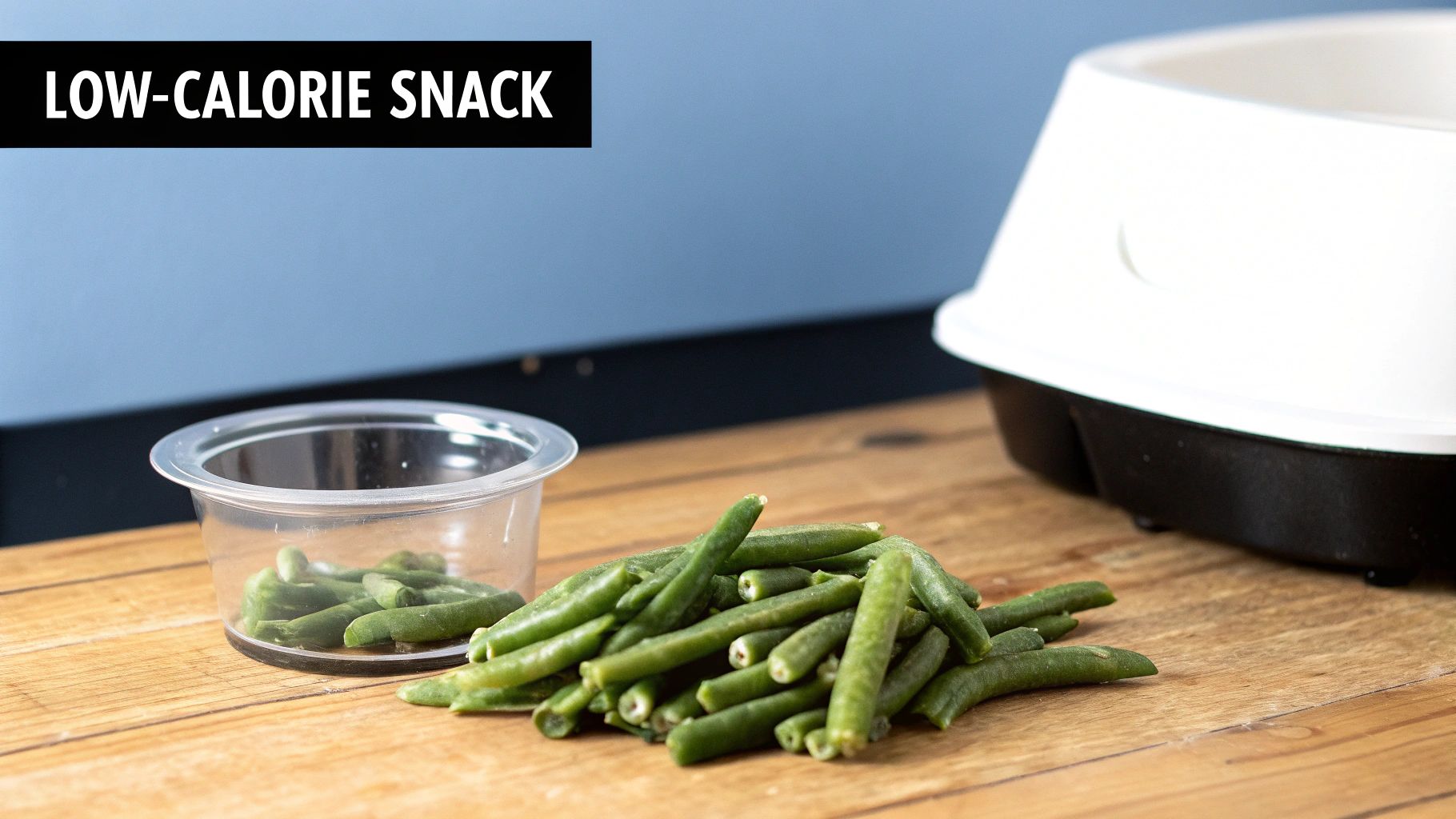 Fresh green beans, a healthy low-calorie snack for pets, on a wooden table with a pet food bowl.