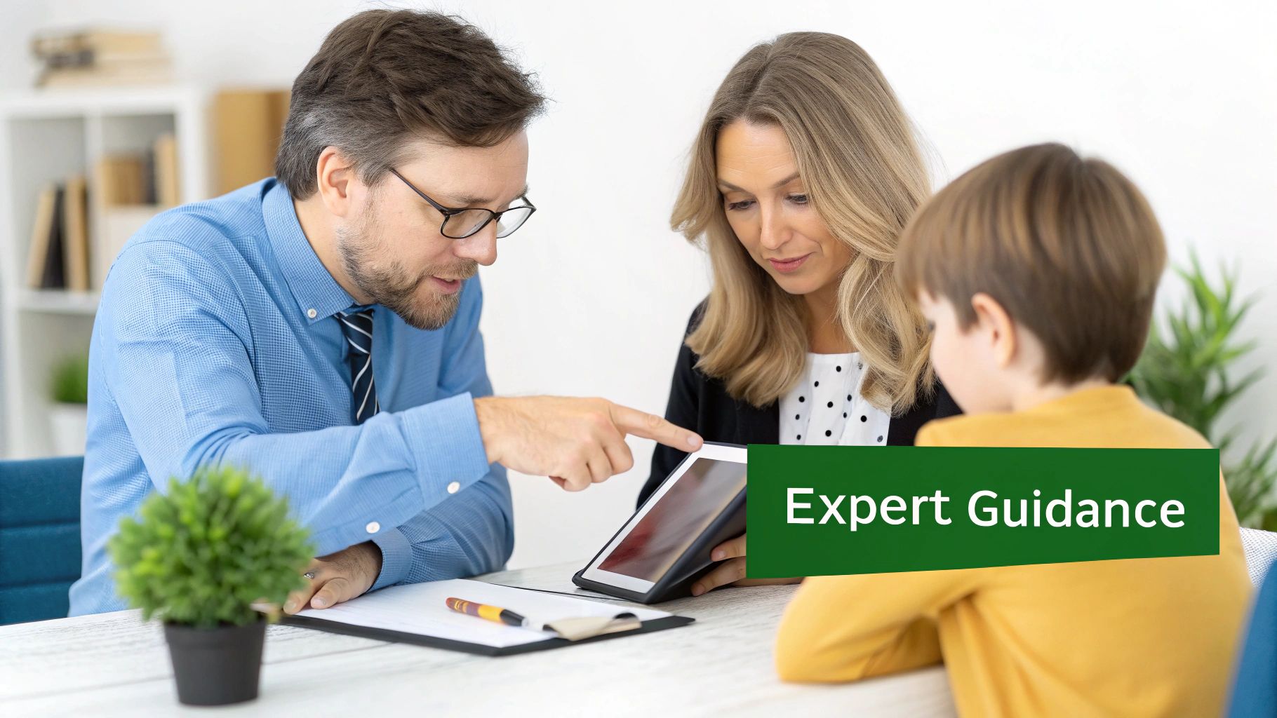 A professional man provides expert guidance to a woman and child, showing information on a tablet in an office.
