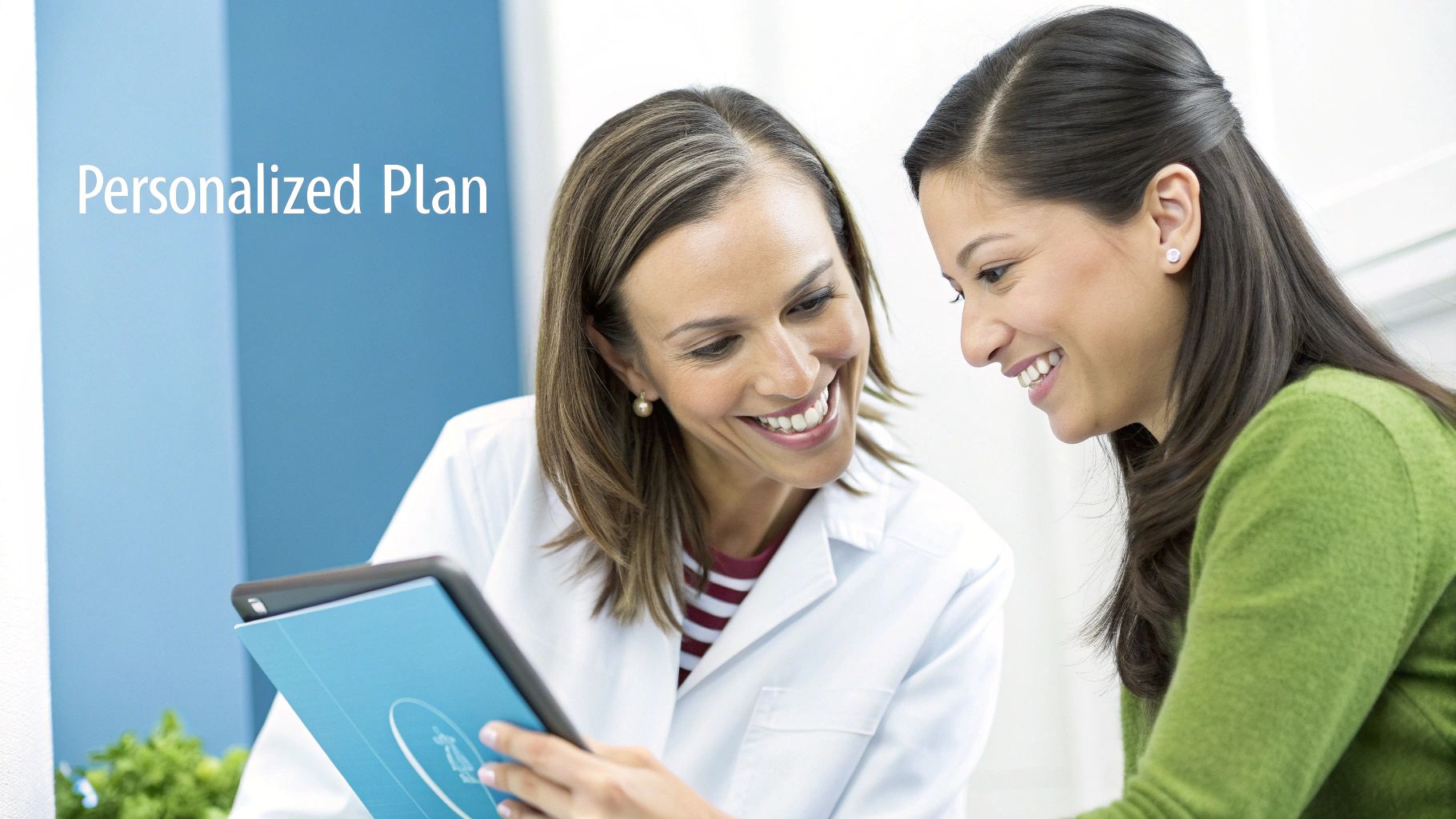 Two smiling women, a medical professional and a patient, discussing a personalized plan on a tablet.