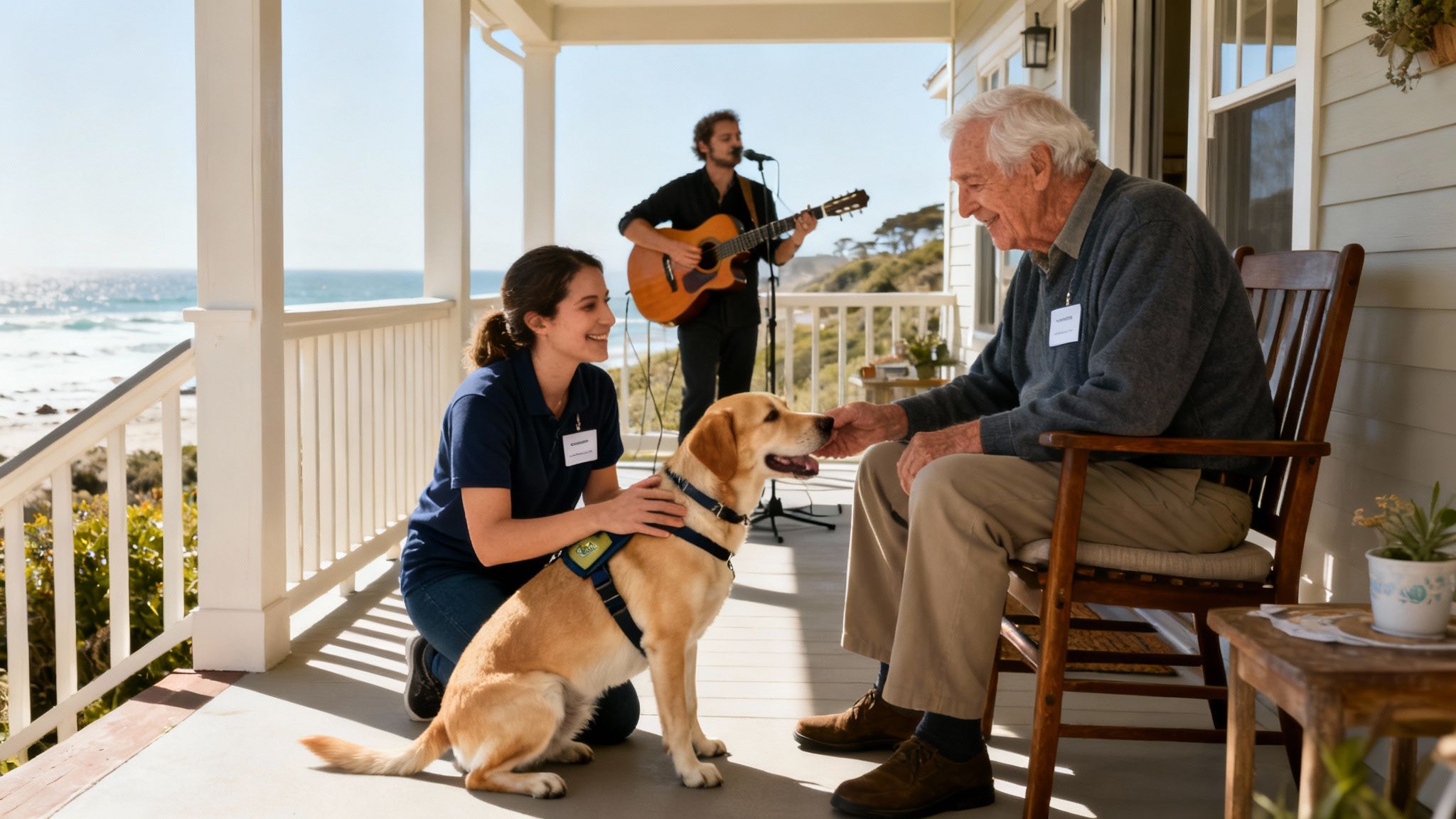 A caregiver, an elderly man, and a service dog enjoy time together on a sunny porch.