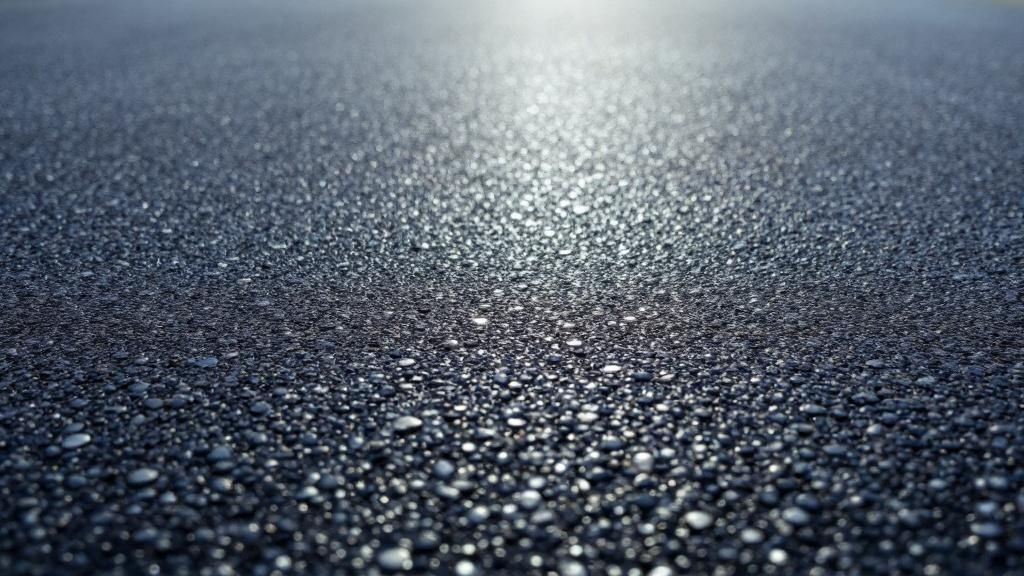 A freshly poured pervious concrete driveway showing its porous texture.