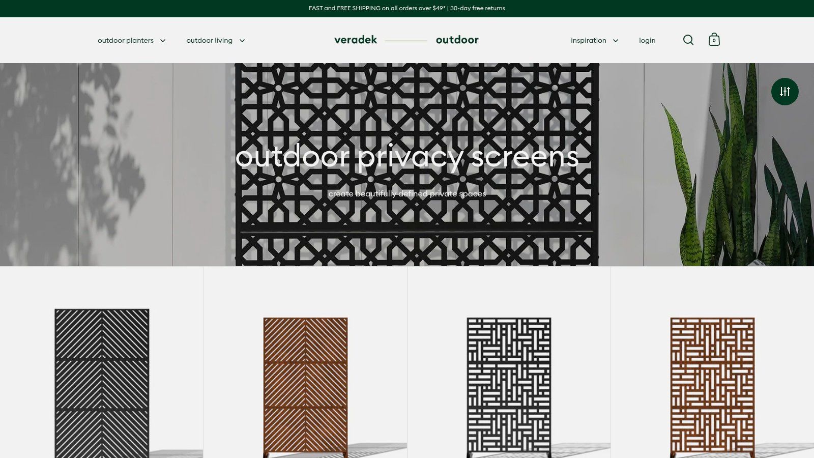 A sleek, modern Veradek outdoor privacy screen with a geometric laser-cut pattern, placed next to a patio seating area.
