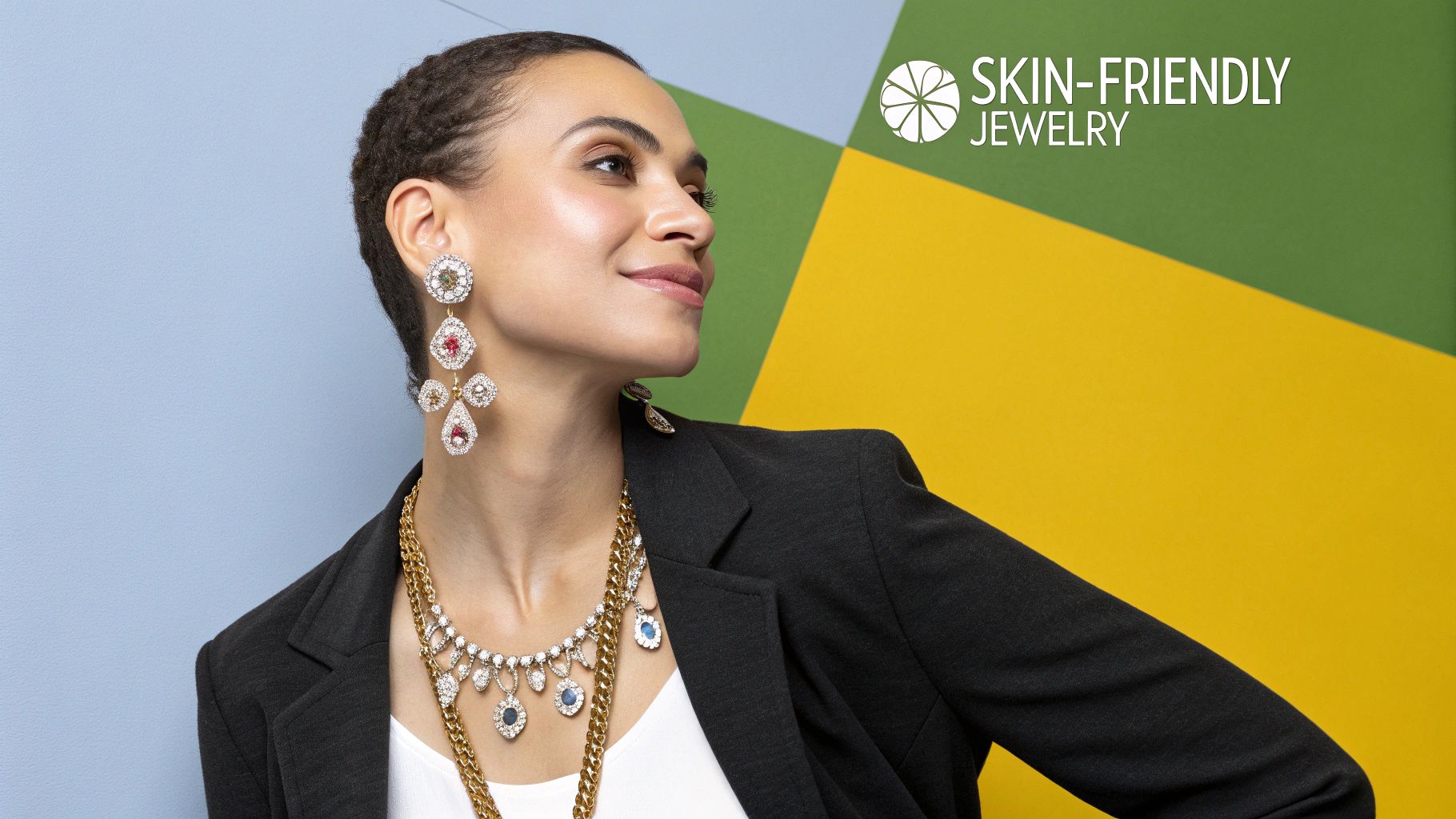 A woman with sensitive skin smiling as she confidently wears a delicate necklace and earrings.