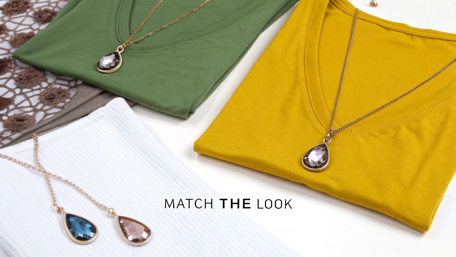 Bridesmaid smiling, wearing a delicate silver necklace and earrings that complement her dress.