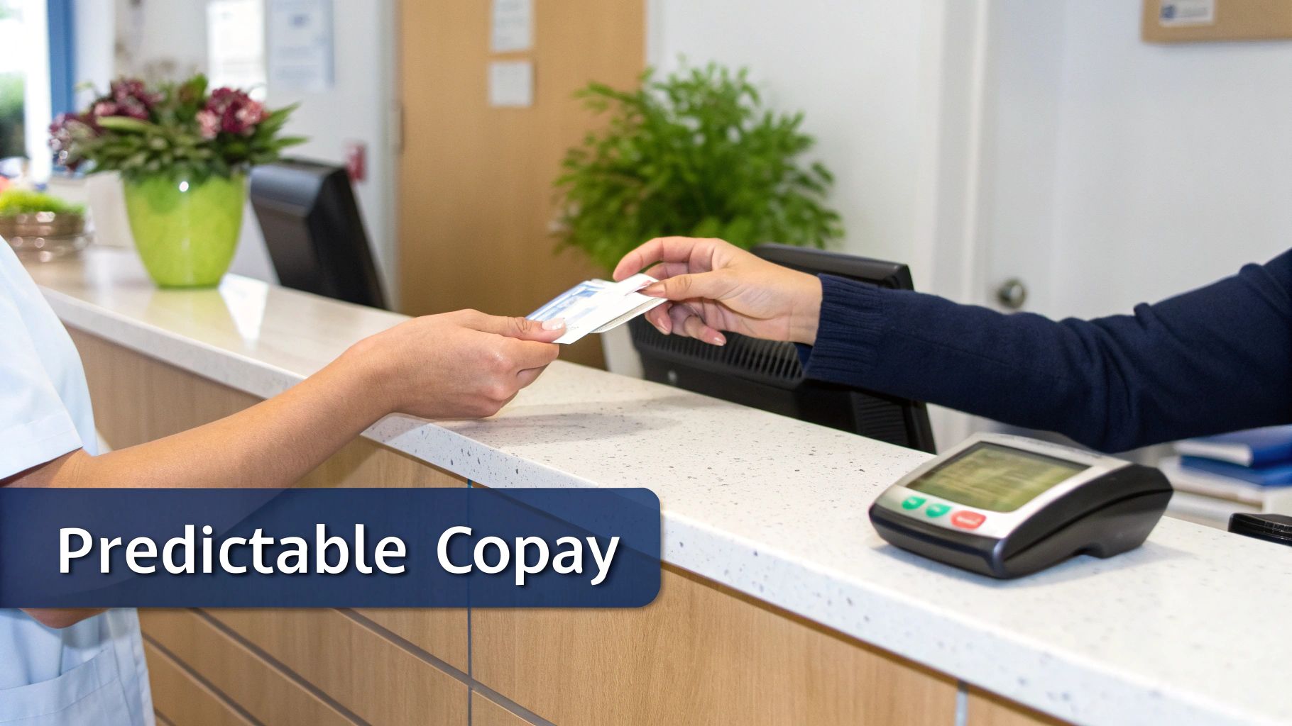A friendly receptionist accepting a payment card from a patient at a clinic's front desk.