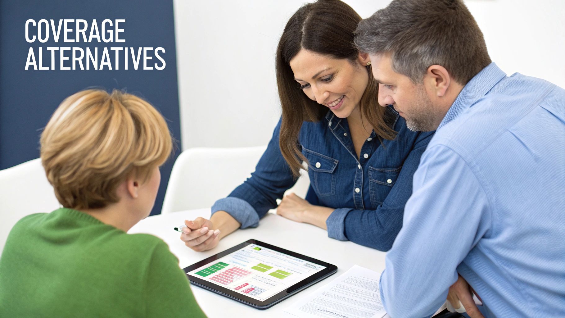 Three people discuss coverage alternatives using a tablet in a modern office setting.