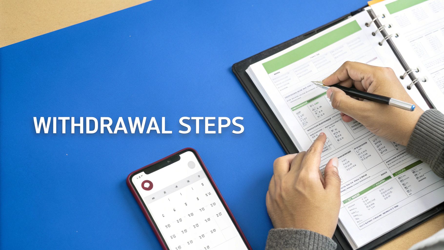 Paperwork and a pen on a desk, representing the process of a 401k withdrawal.