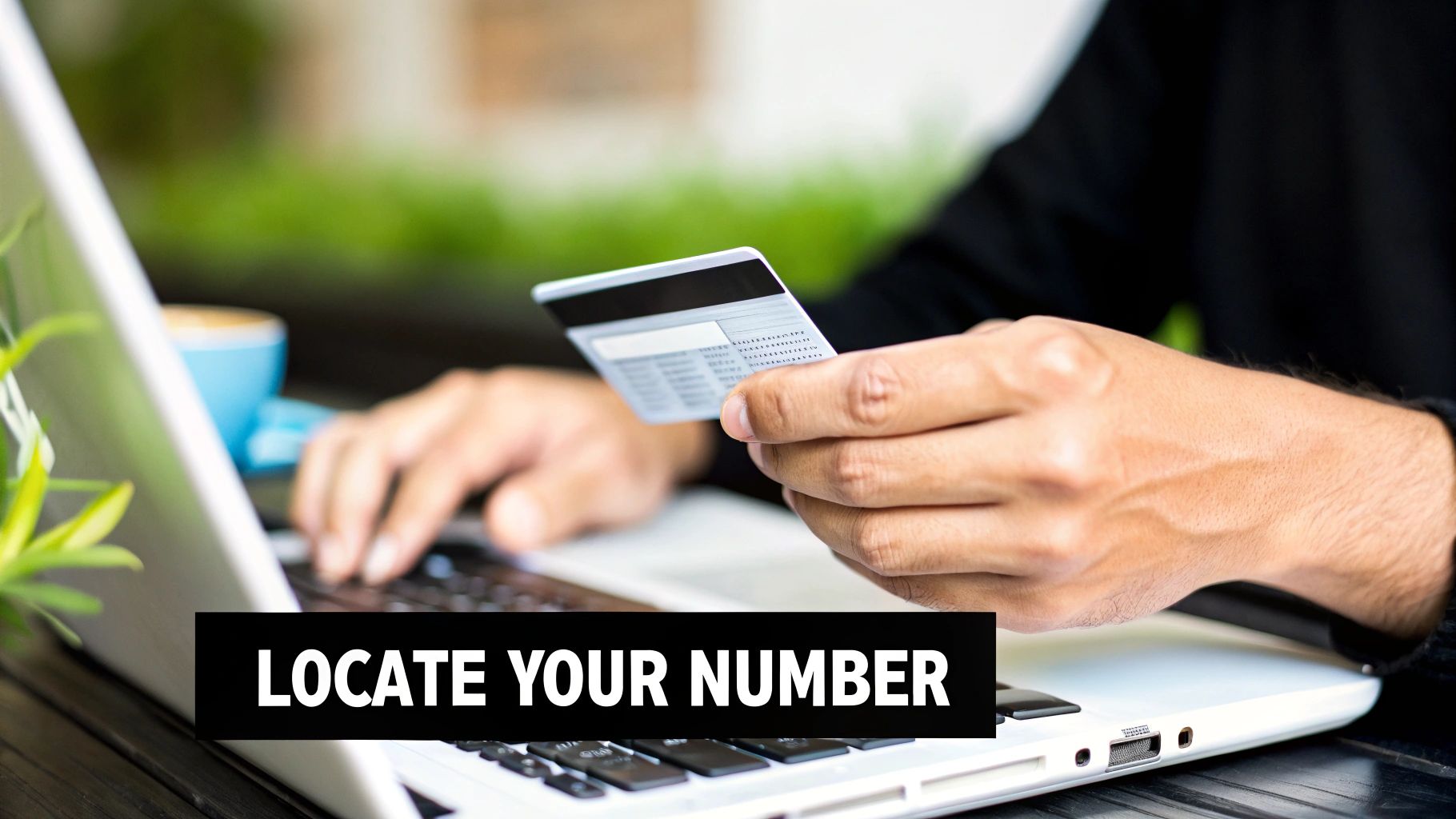 A person is reviewing their health insurance policy documents and card at a desk.