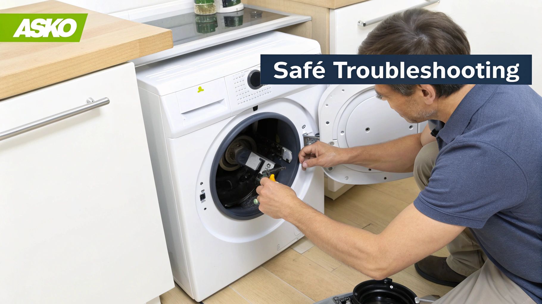A man safely troubleshooting and repairing an ASKO washing machine with tools.