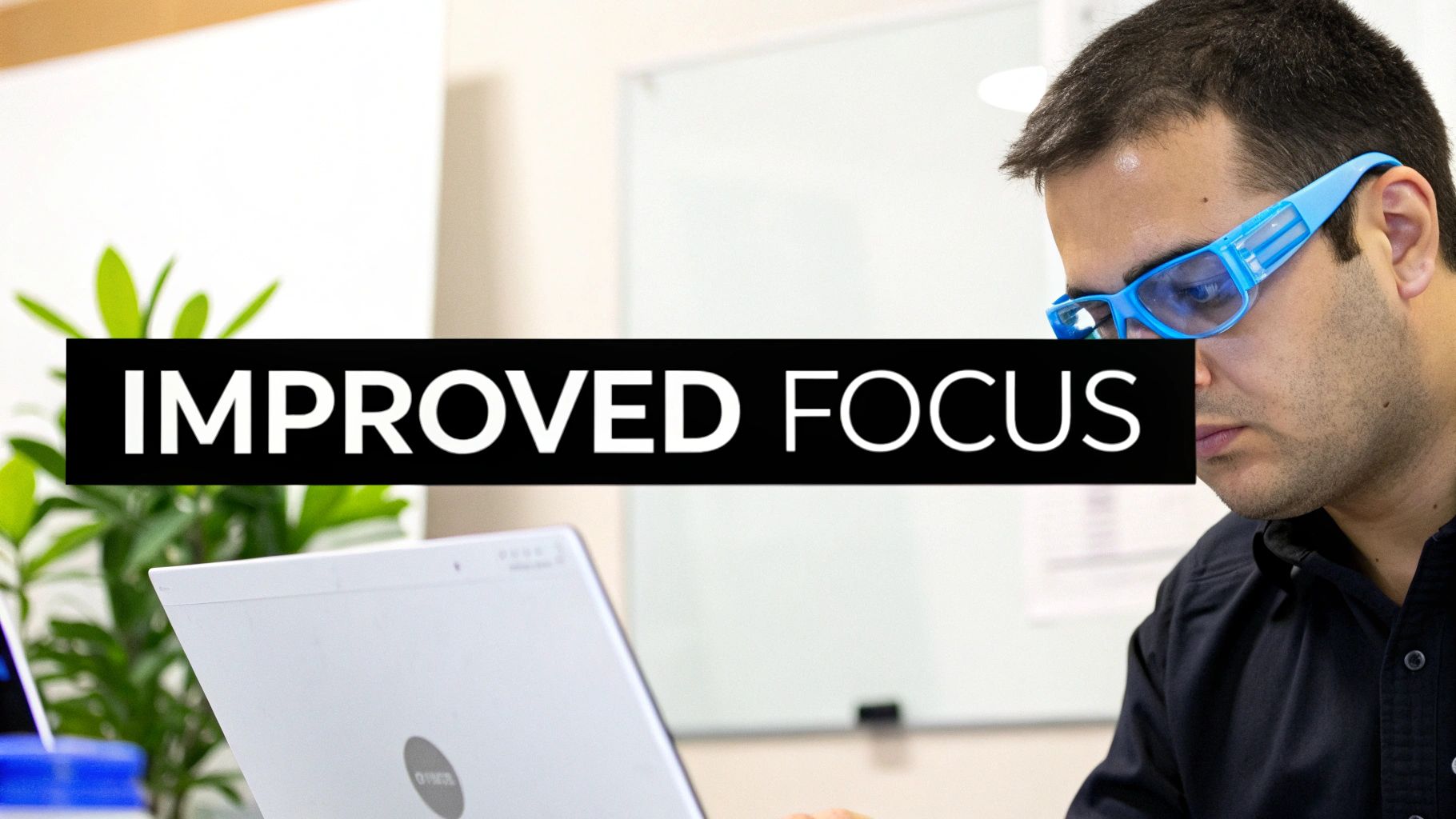 A person wearing Element Lux amber-lensed blue light blocking glasses while relaxing on a couch.