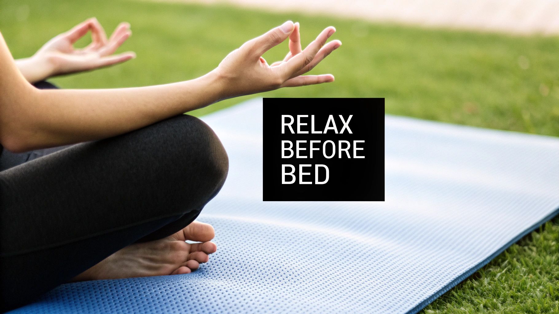 A pair of stylish Element Lux blue light blocking glasses resting on an open book on a wooden surface.