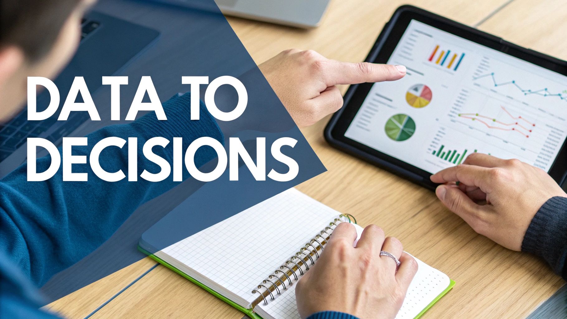 Hands point at data charts on a tablet while taking notes, symbolizing data analysis for decisions.
