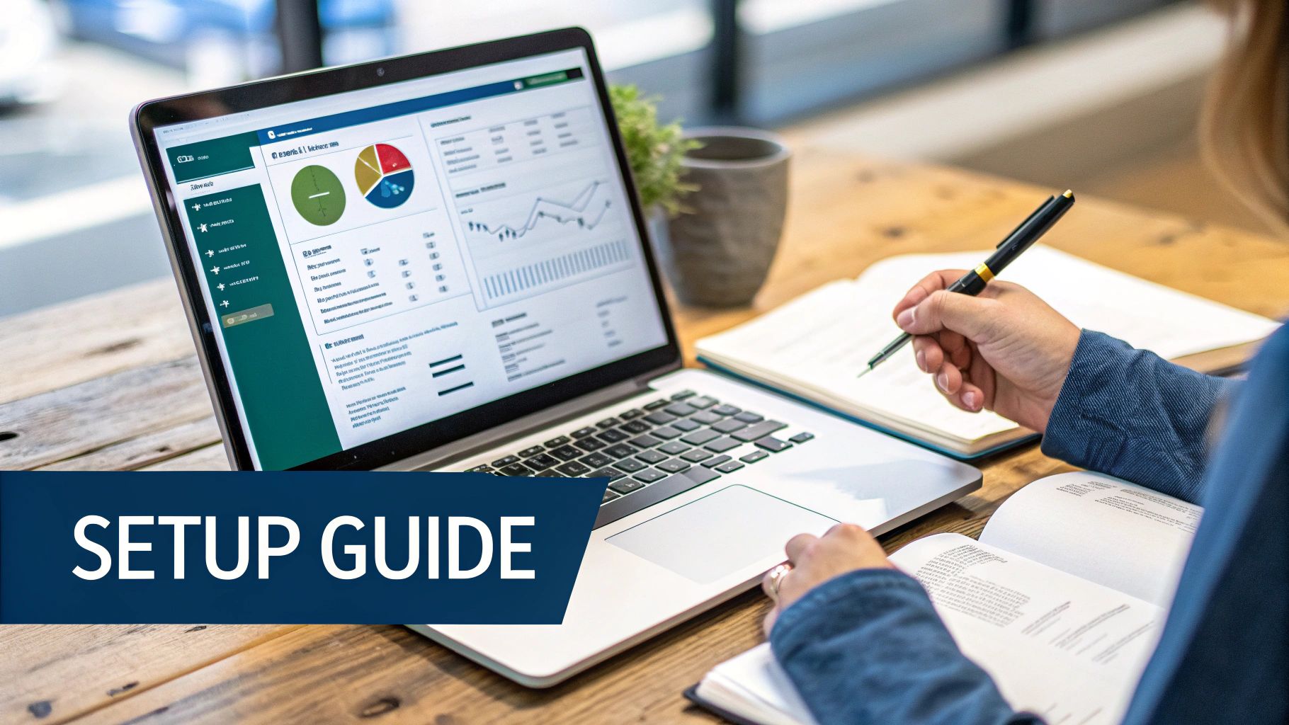 A person studying a laptop displaying charts and graphs, while writing in a notebook.