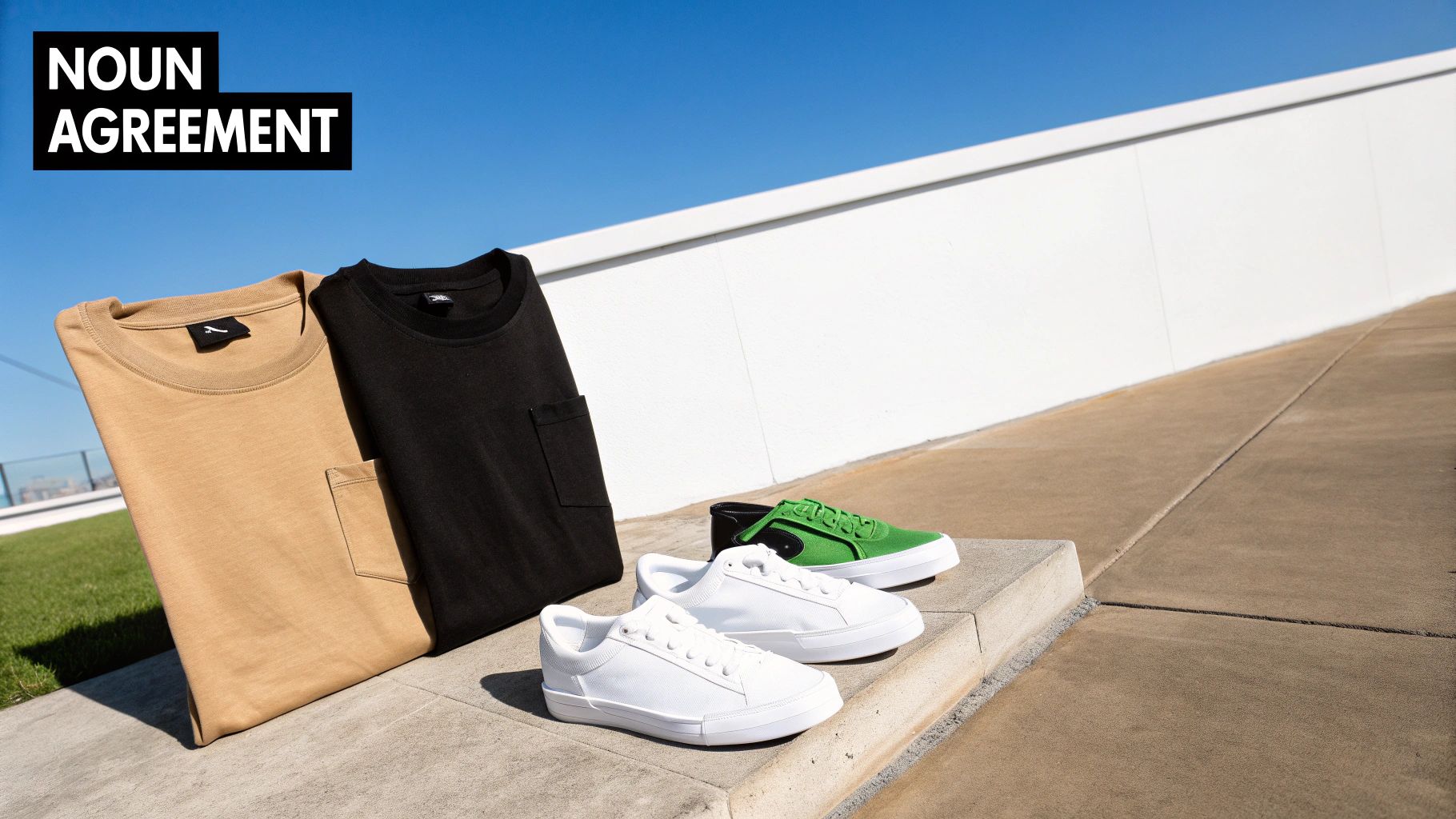 Tan and black t-shirts with white and green sneakers on concrete steps outdoors.