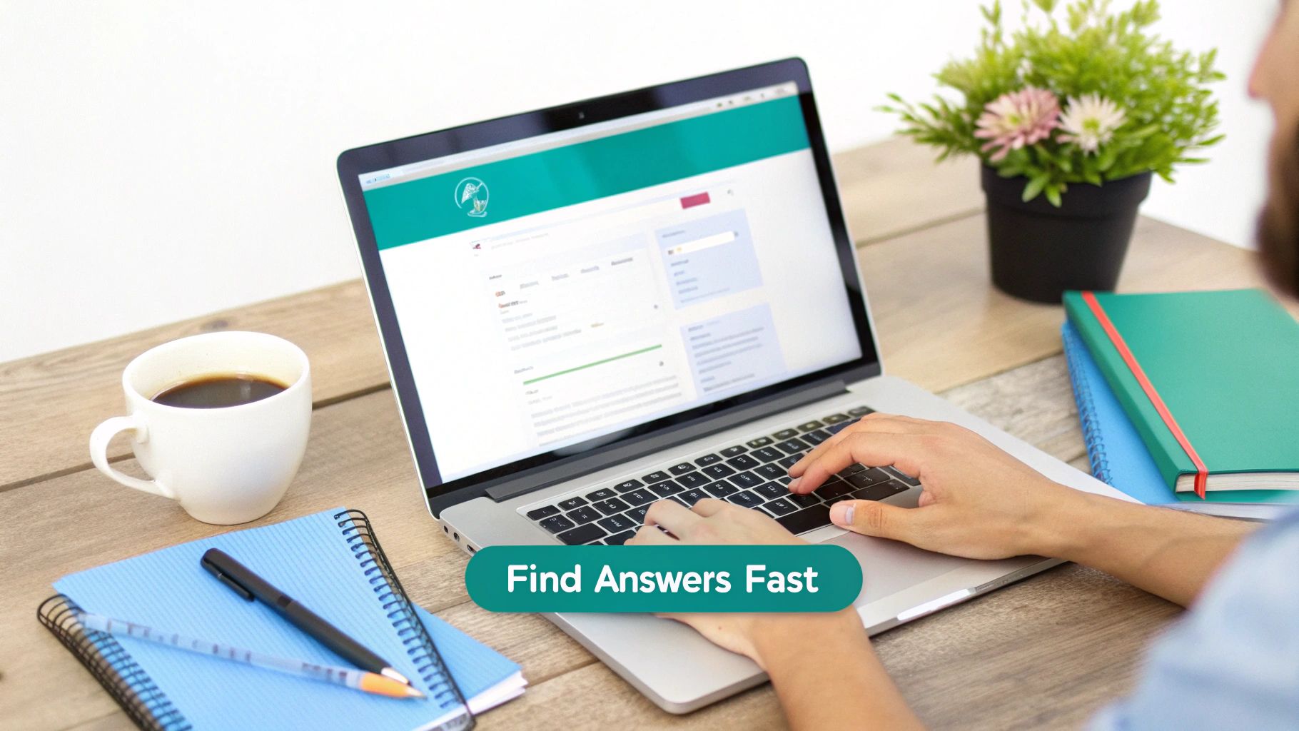 Person typing on a laptop at a wooden desk with a coffee cup and notebooks, finding answers fast.