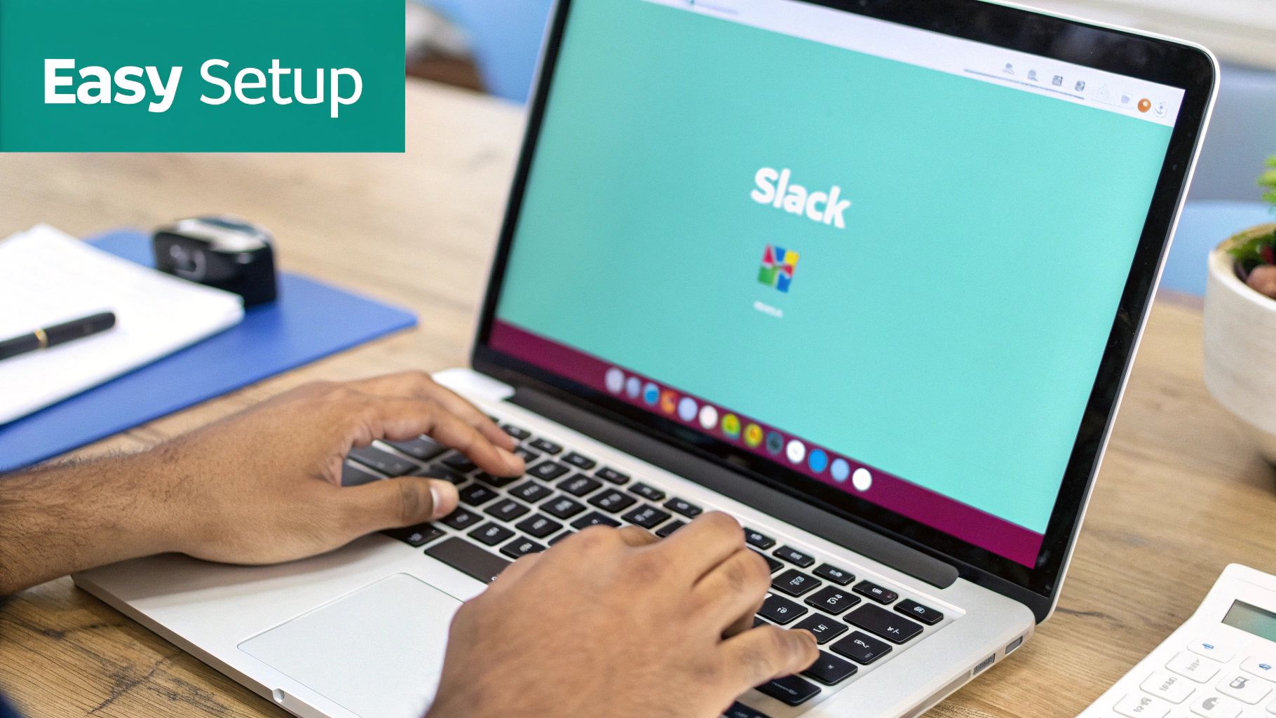 A person's hands typing on a laptop screen displaying the Slack logo and "Easy Setup".