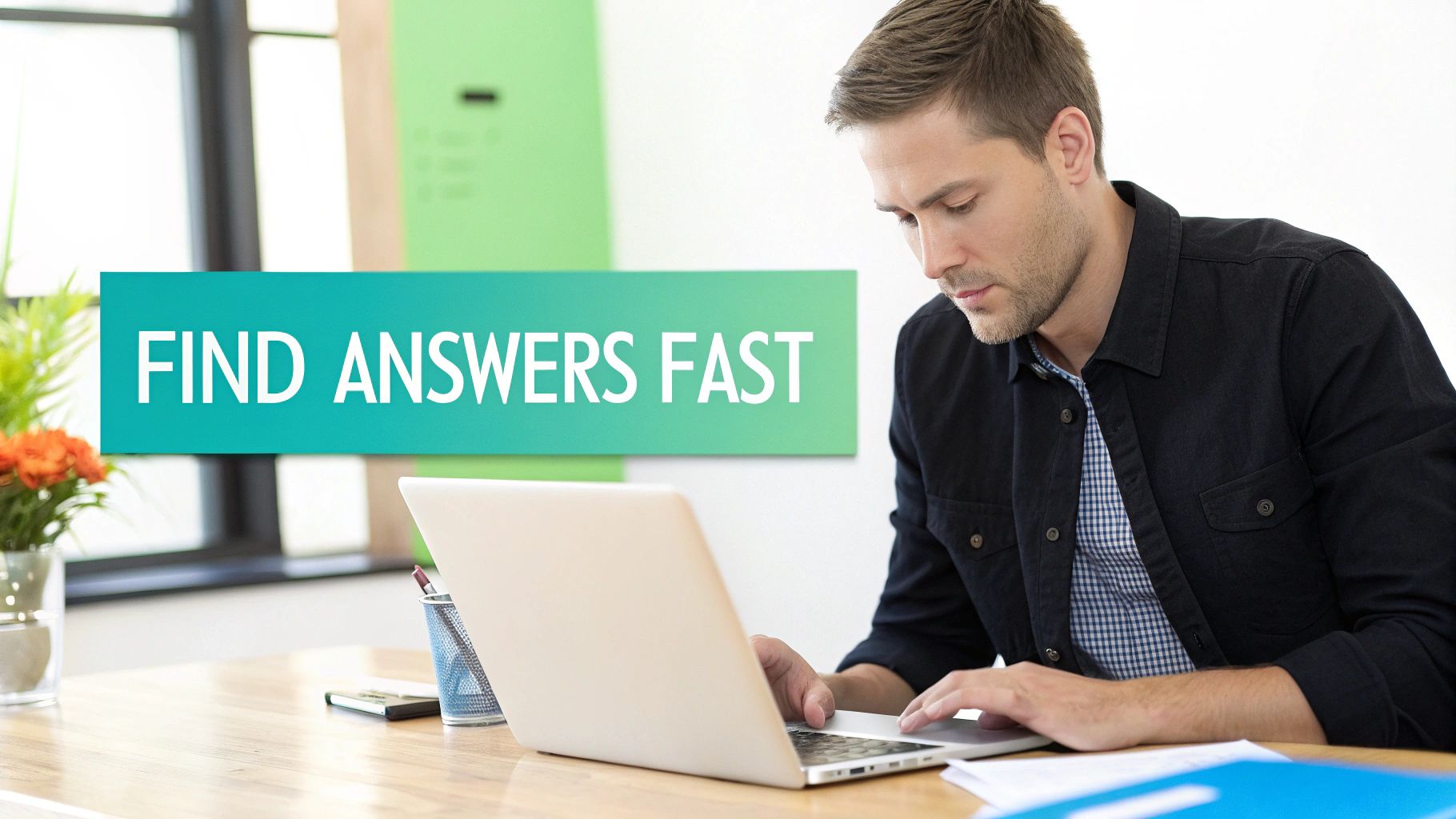 A man diligently works on a laptop at a desk, next to a teal banner displaying 'FIND ANSWERS FAST'.