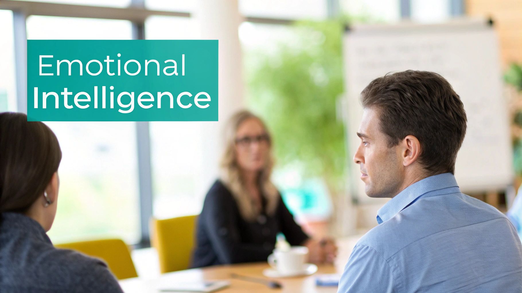Business professionals in modern office meeting discussing emotional intelligence leadership training concepts