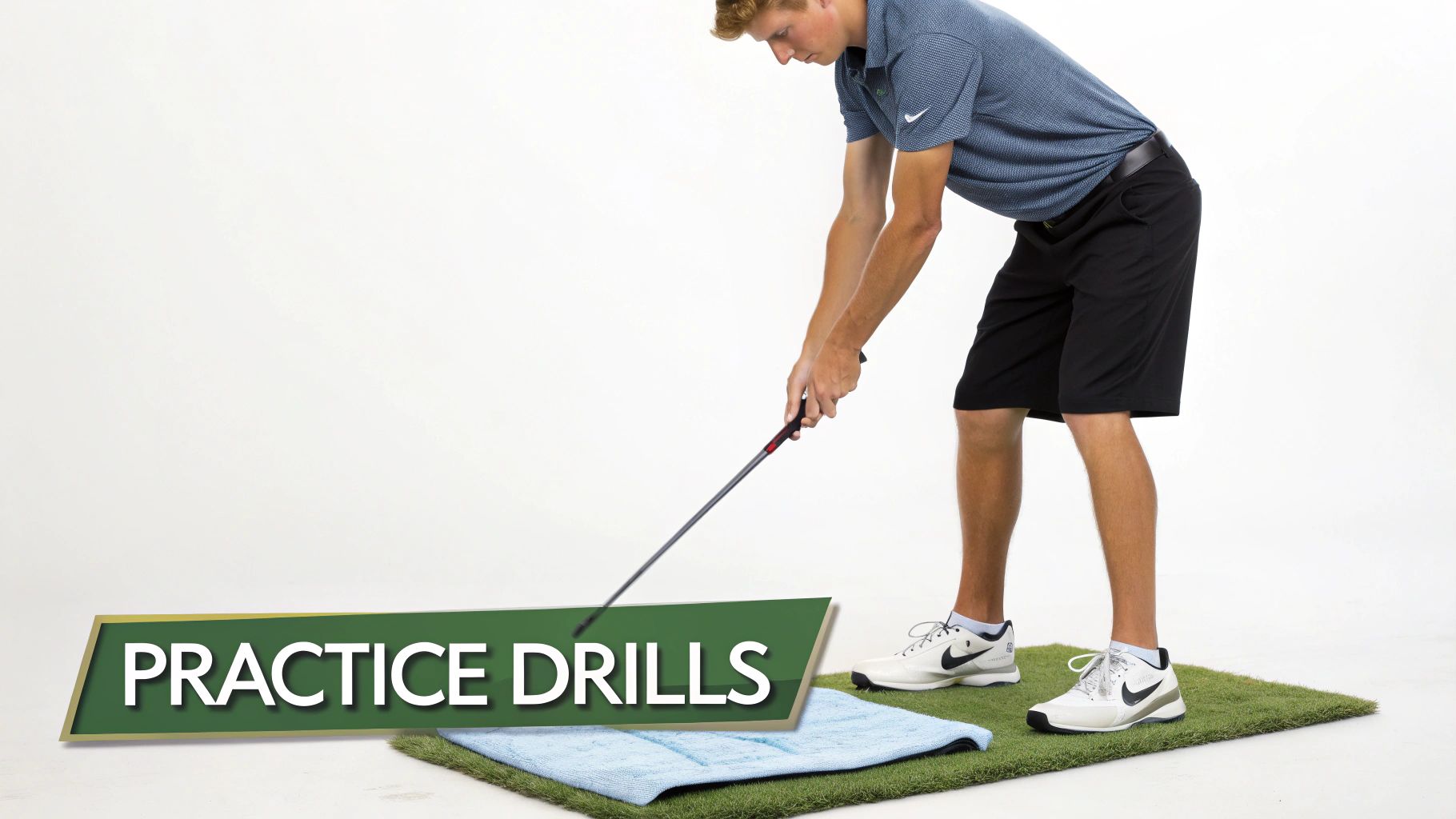 A golfer at a driving range, with a golf bag and a bucket of balls, focused on practice.