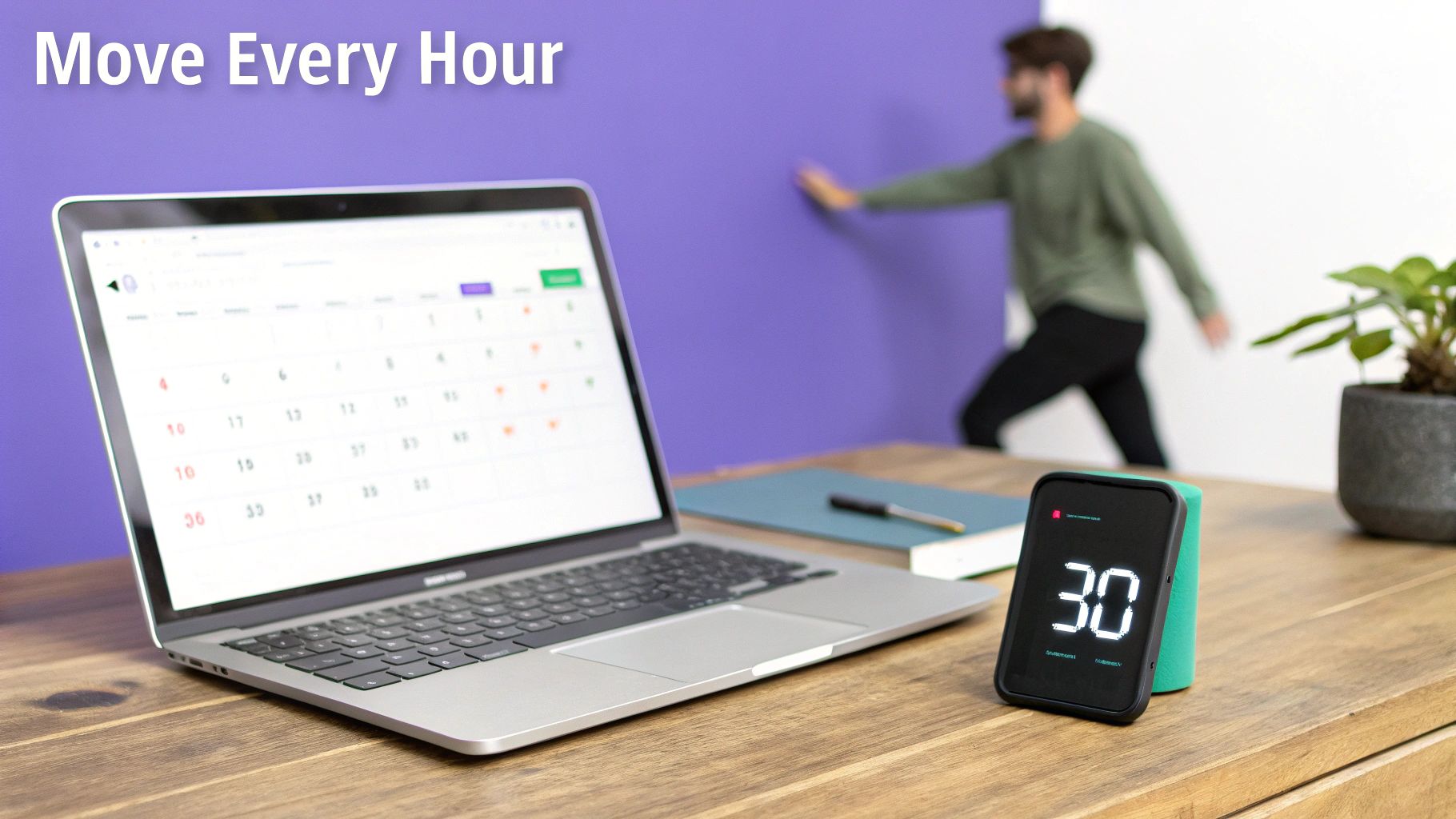 Person stretching at their desk with a laptop