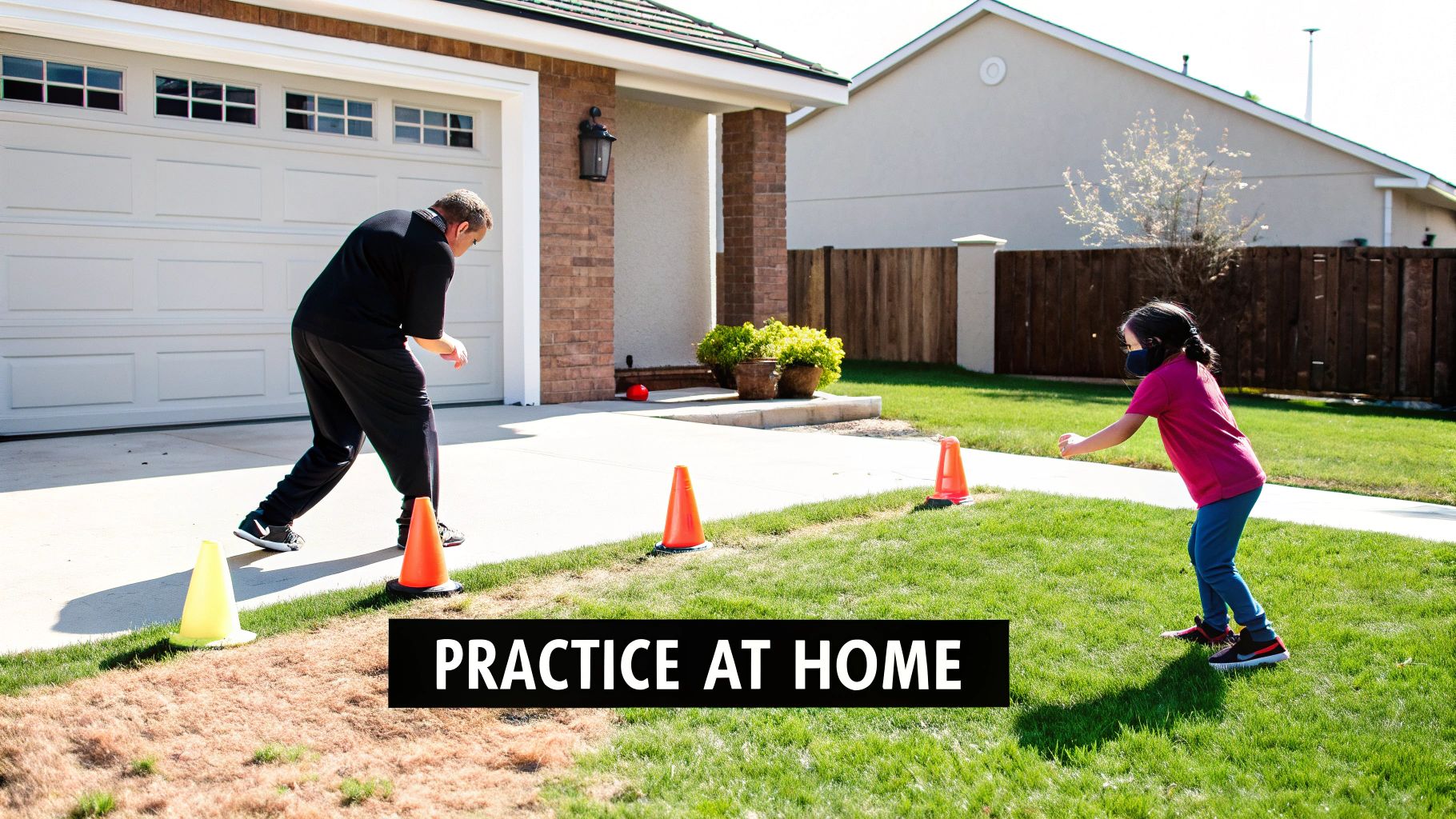 A man and a child with a mask practice a sport with orange cones in a sunny front yard.