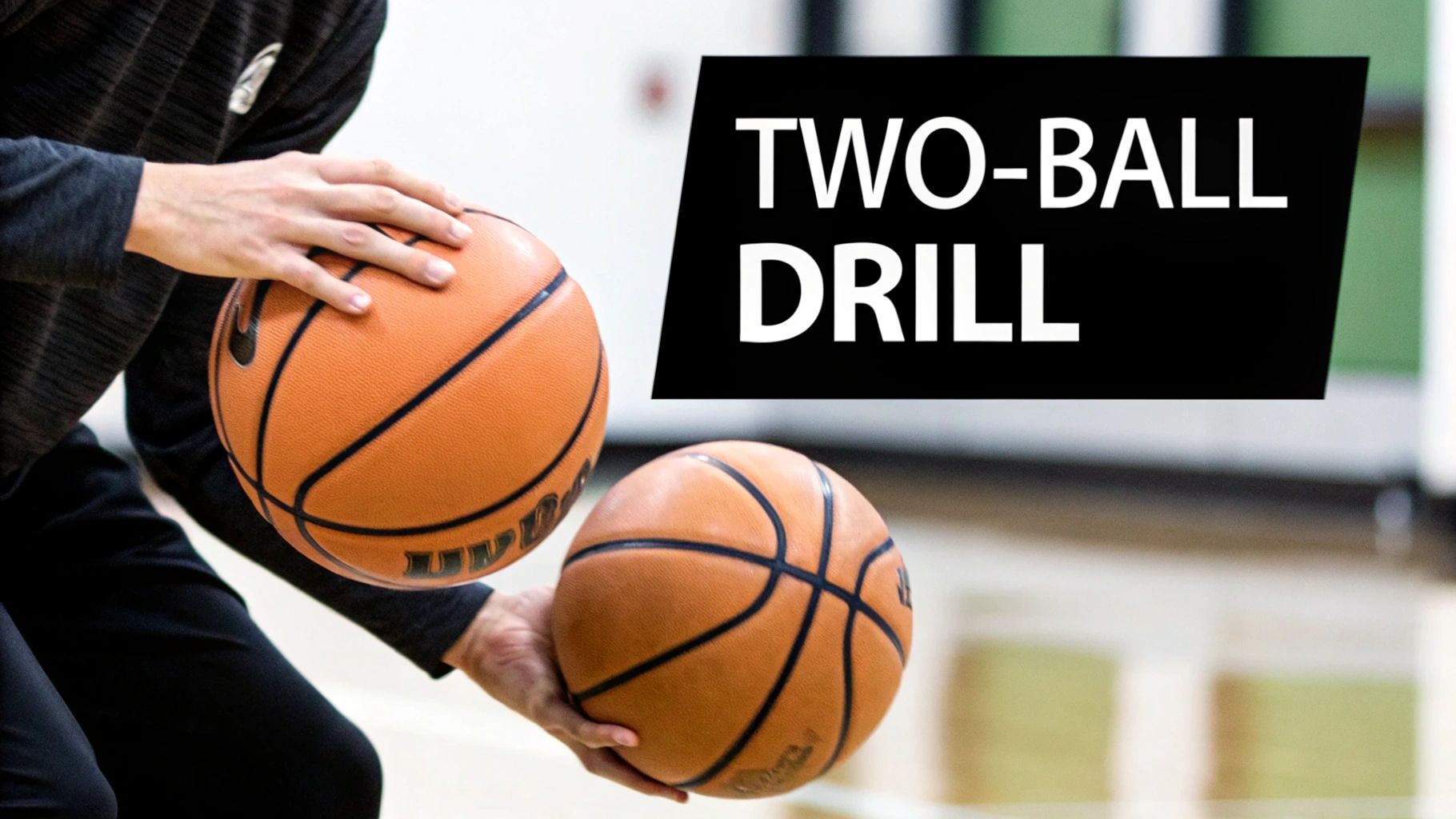 A person in athletic wear holds two basketballs, practicing a two-ball dribbling drill on a court.
