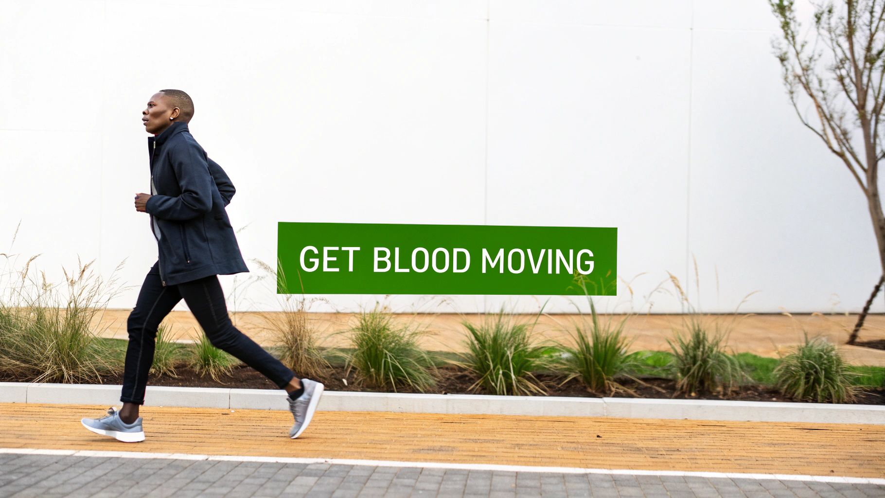 A person with short hair runs on a paved path next to a white wall and green plants, with a green banner 'GET BLOOD MOVING'.