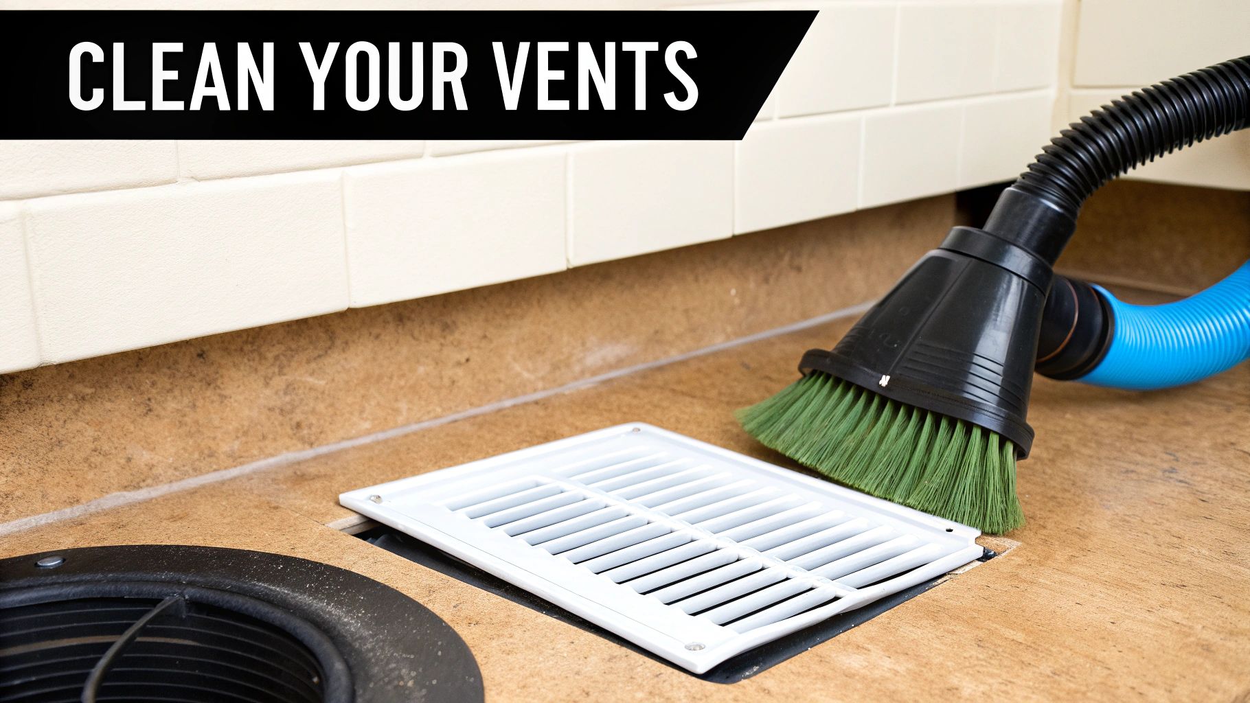 A close-up shot of a vacuum cleaner brush attachment cleaning a dusty floor air vent.