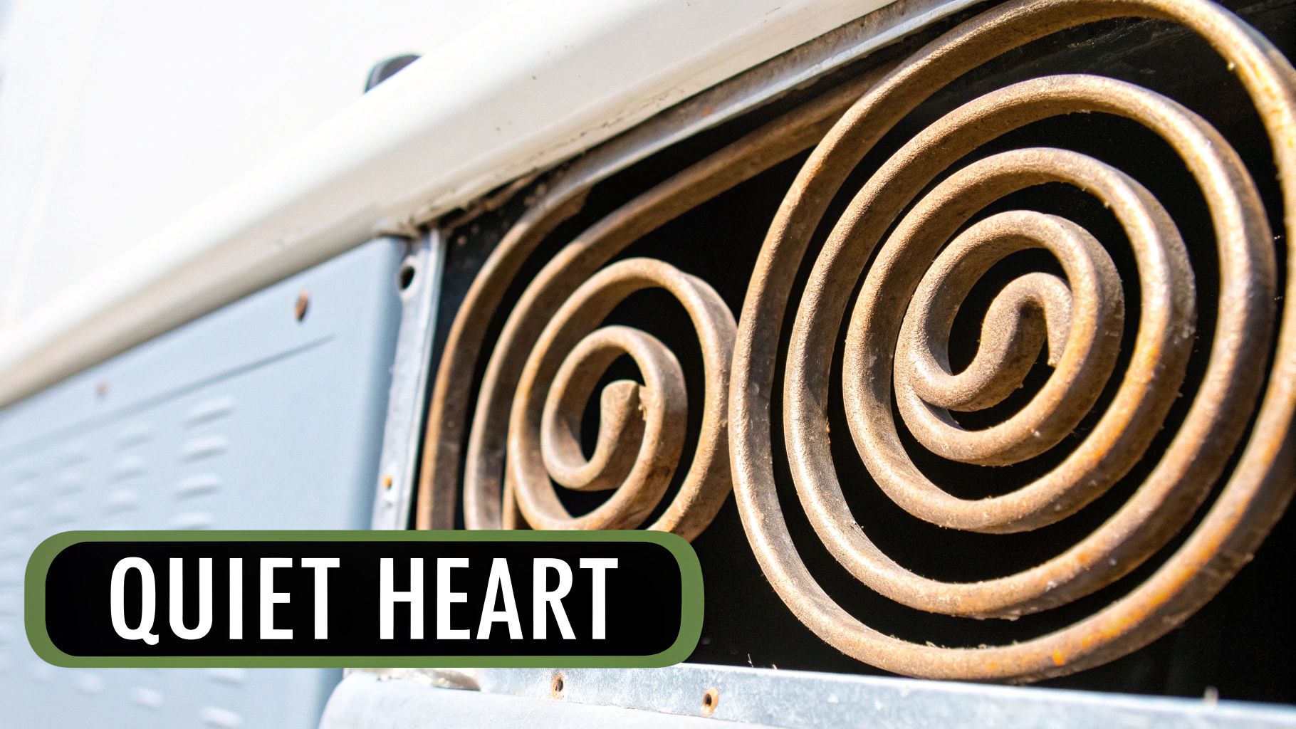 A cutaway view of a scroll compressor showing its internal spirals