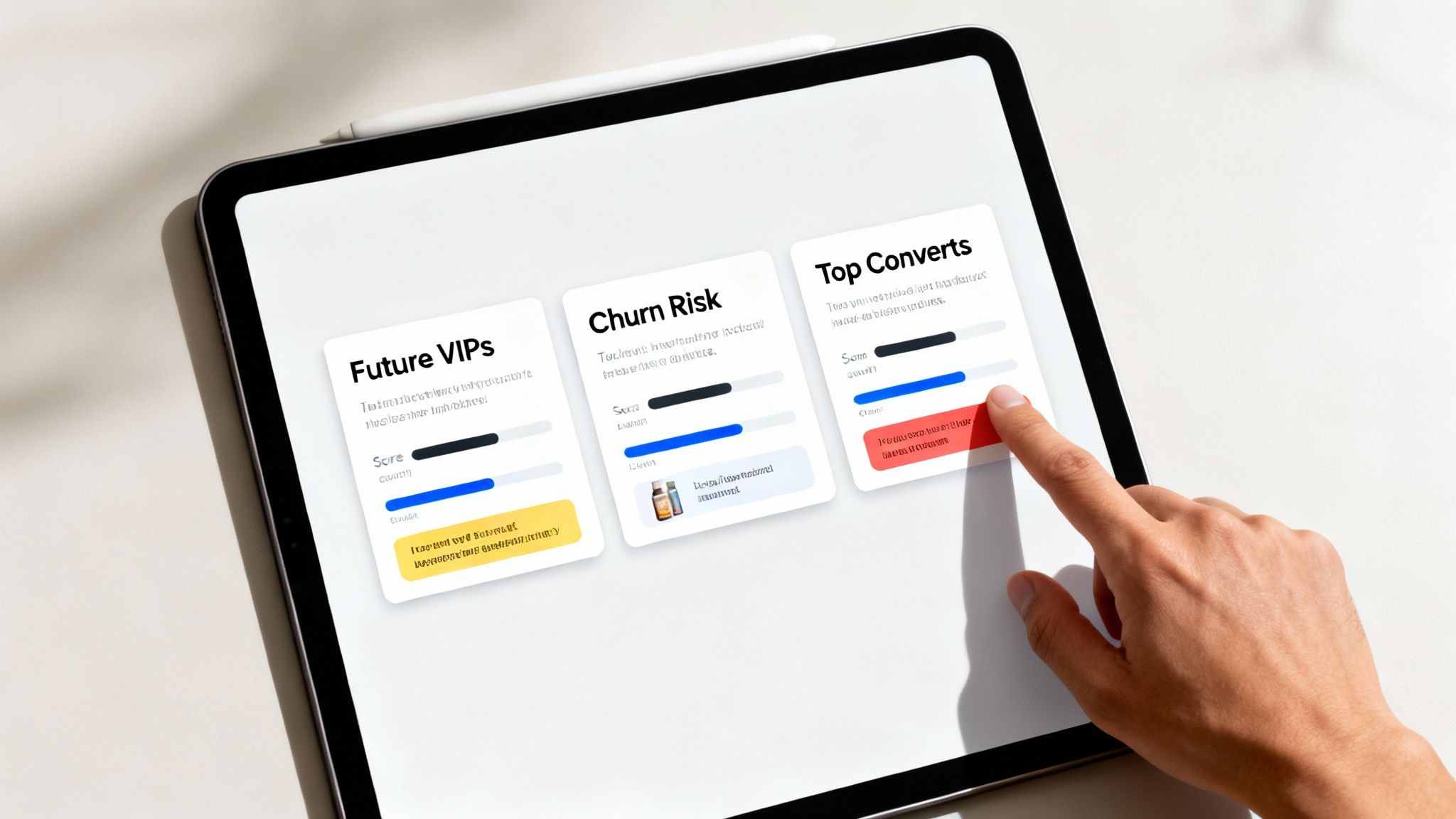 A hand touches a tablet screen displaying predictive analytics marketing dashboards with cards for VIPs, Churn Risk, and Top Converts.