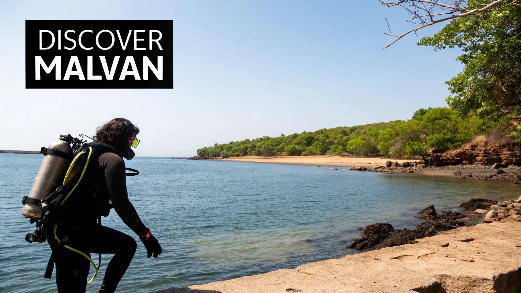 A scuba diver exploring the vibrant underwater world of Malvan