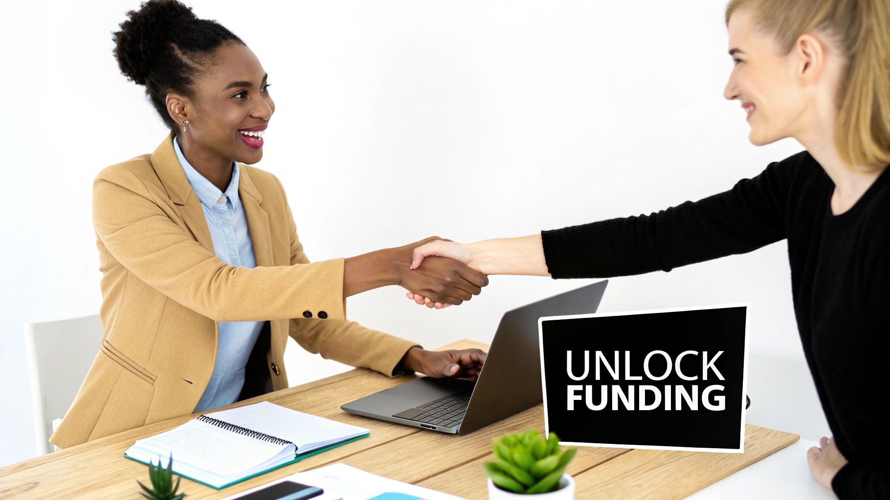 A group of diverse nonprofit professionals collaborating around a table