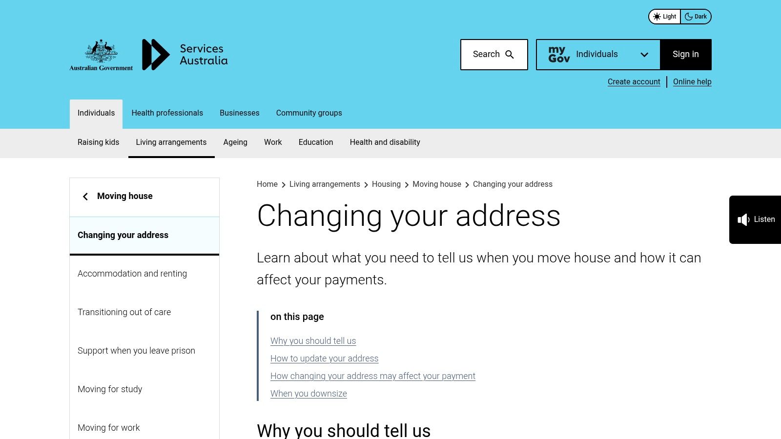 A person on a laptop, focused on updating their address online with Services Australia.