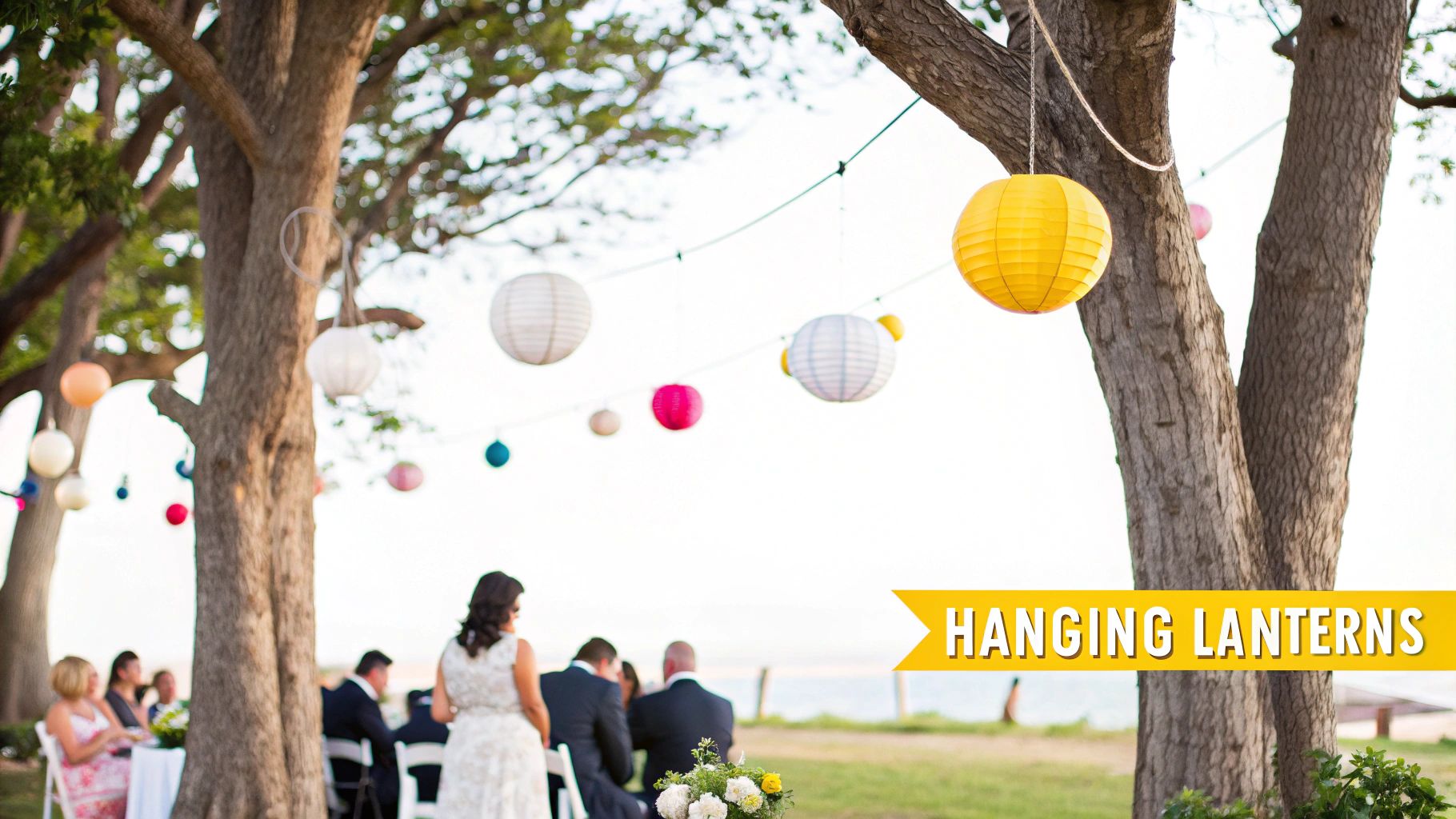 10 Breathtaking Outdoor Wedding Lighting Ideas for Your Knoxville Nuptials Beautiful outdoor scene with colorful paper lanterns strung between large trees over a wedding reception.