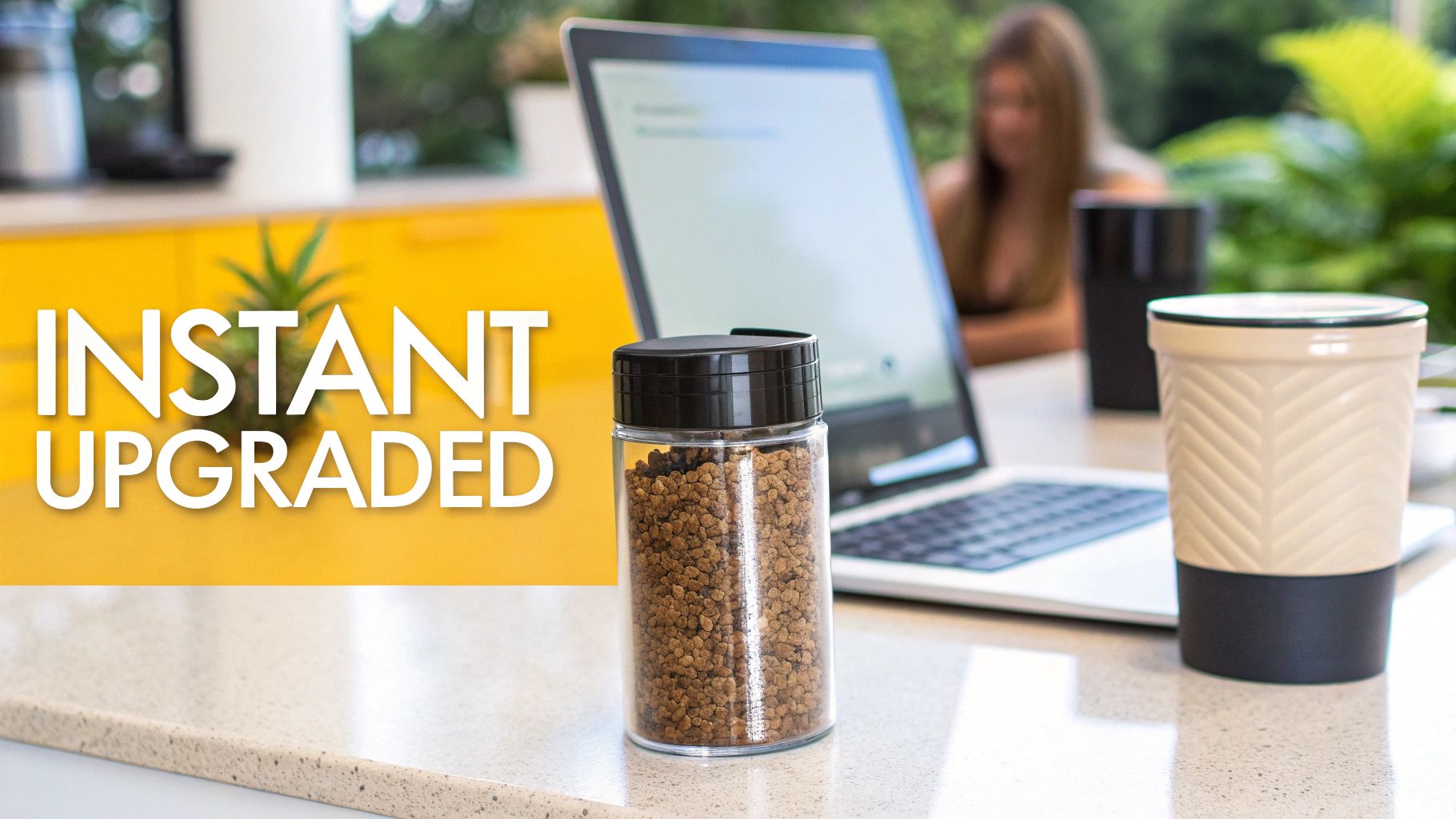 A jar of instant coffee granules, a travel mug, and a laptop on a counter with 'INSTANT UPGRADED' text.