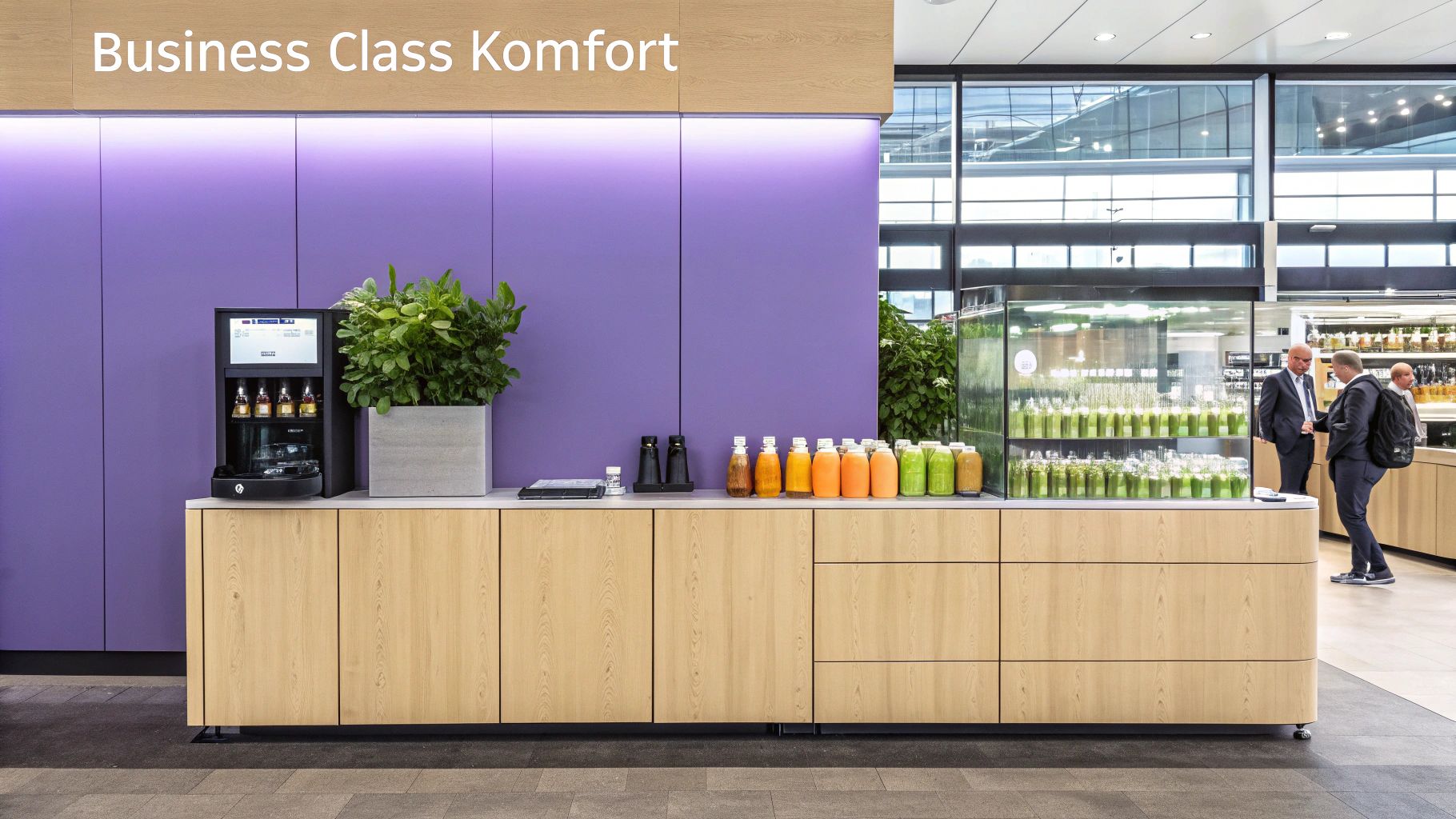 Ein einladender Bereich in der Emirates Business Class Lounge mit einer Vielzahl von Sitzgelegenheiten und einem eleganten Design.