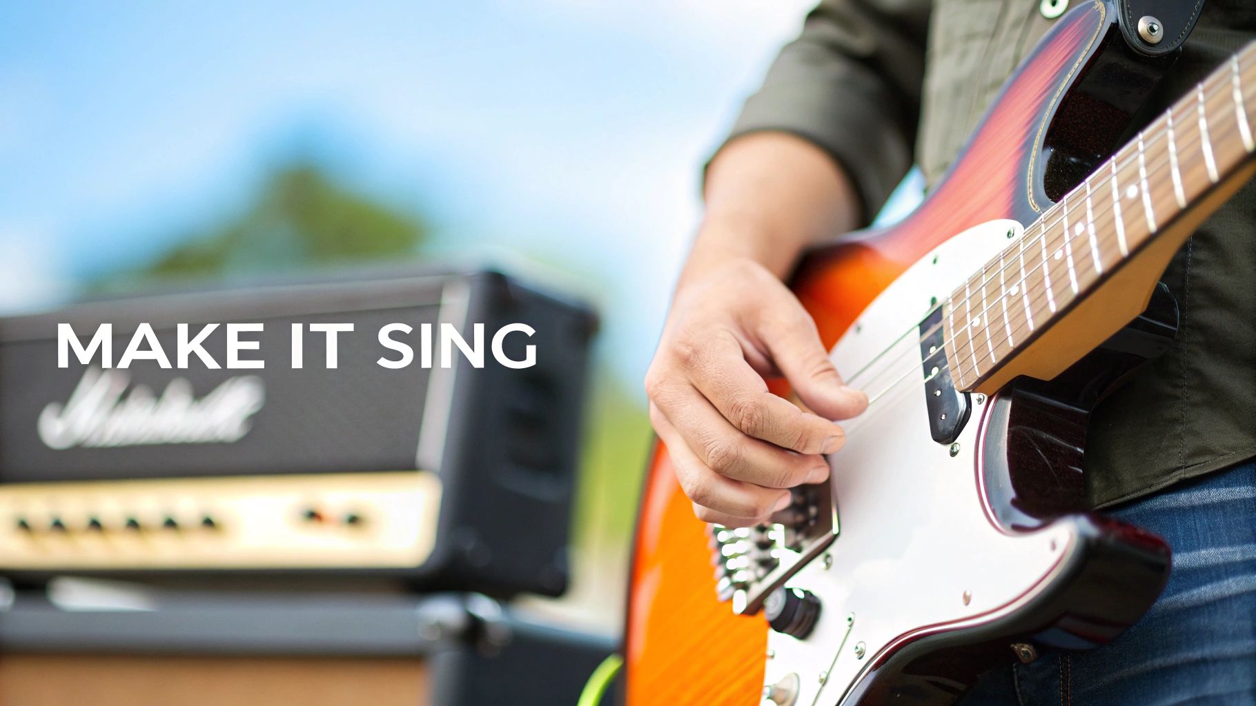 A person playing an electric guitar with a classic Marshall amplifier and the text 'MAKE IT SING'.