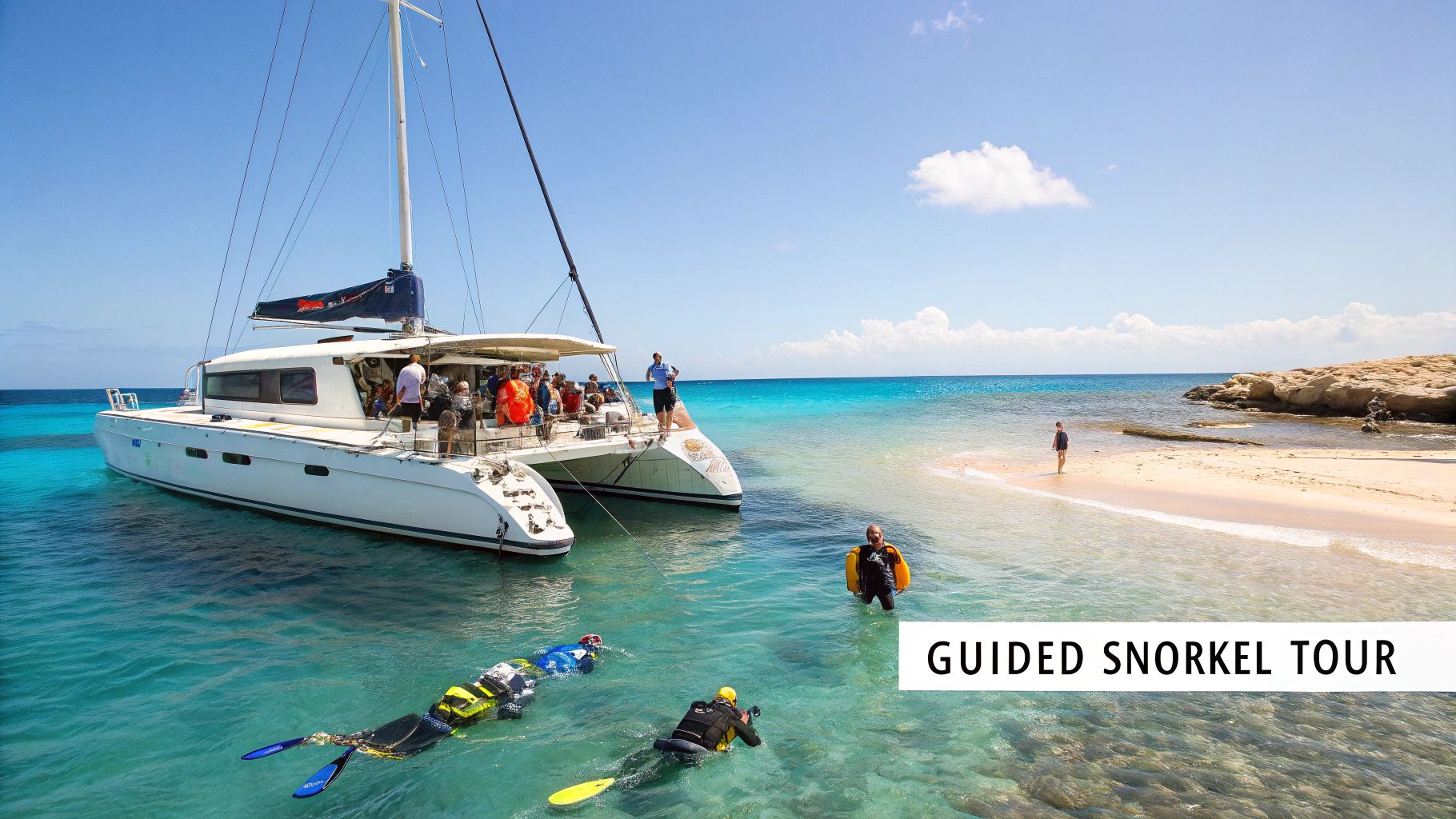A snorkeling tour boat anchored near a vibrant coral reef in Marathon, FL.